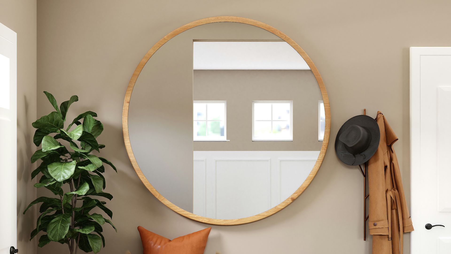 brown wooden framed mirror on white wall