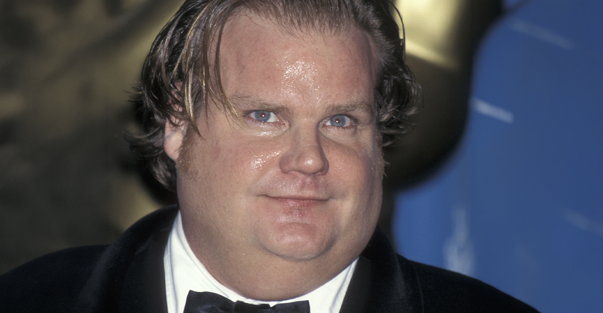 Chris Farley in a suit