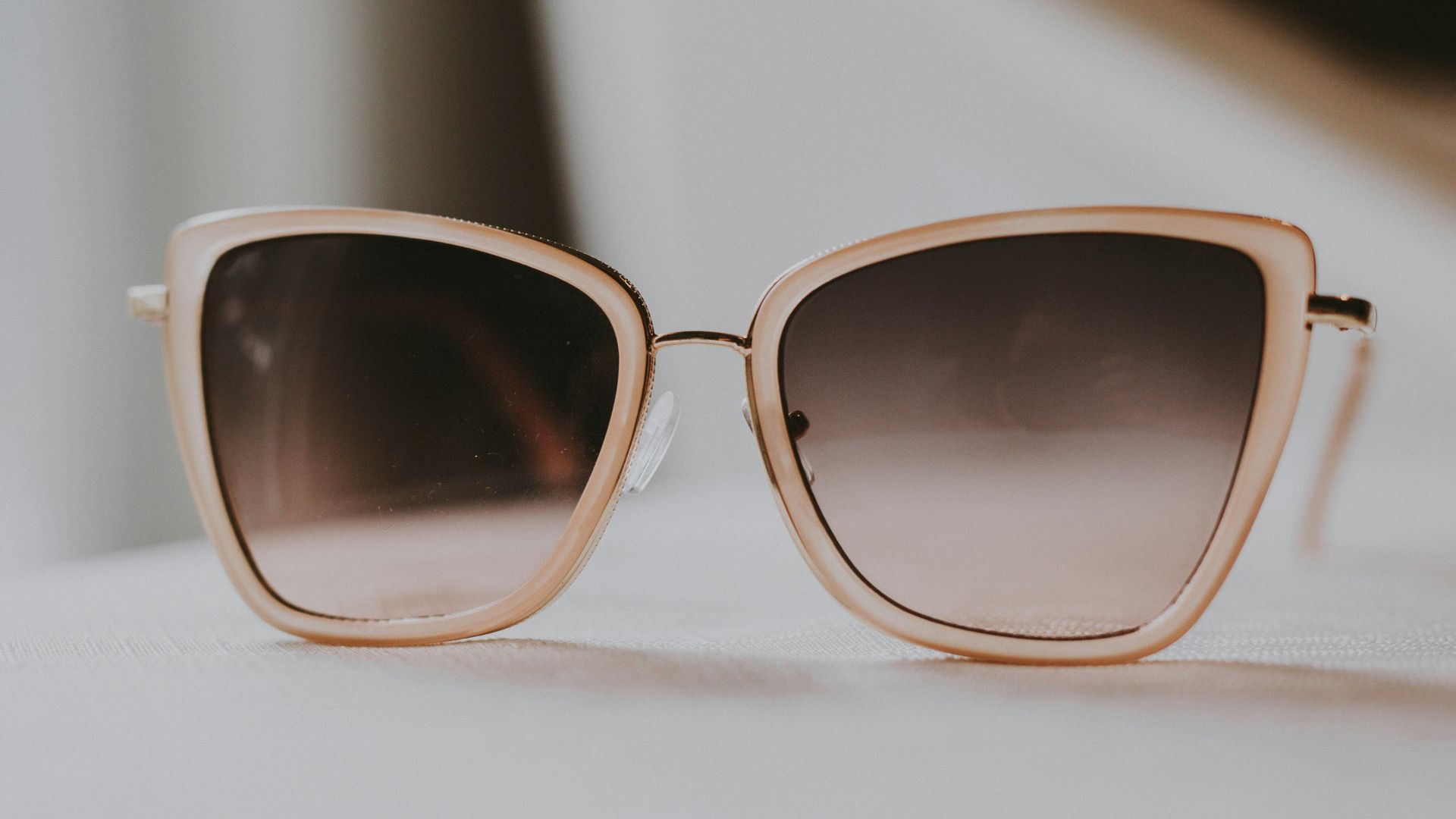 gray sunglasses with white frames