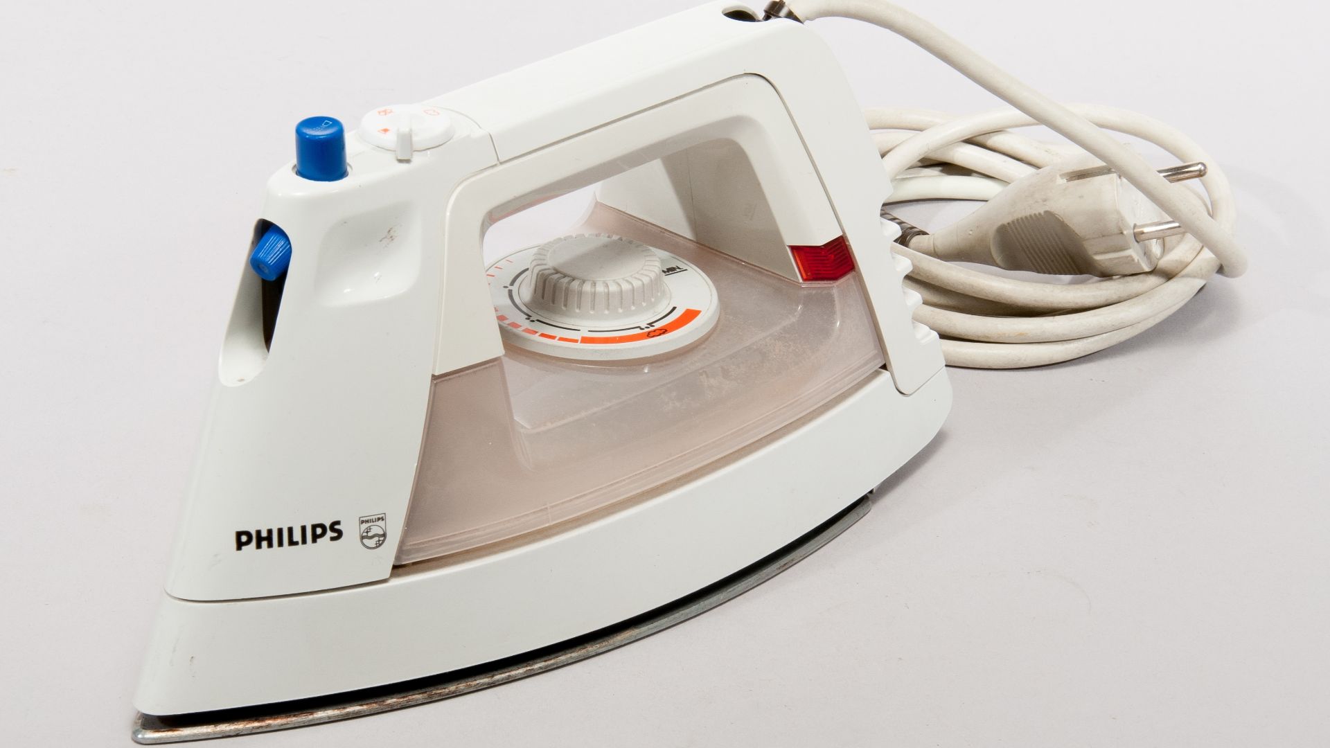 Philips HD 1256 A Steam iron made of plastic and steel.