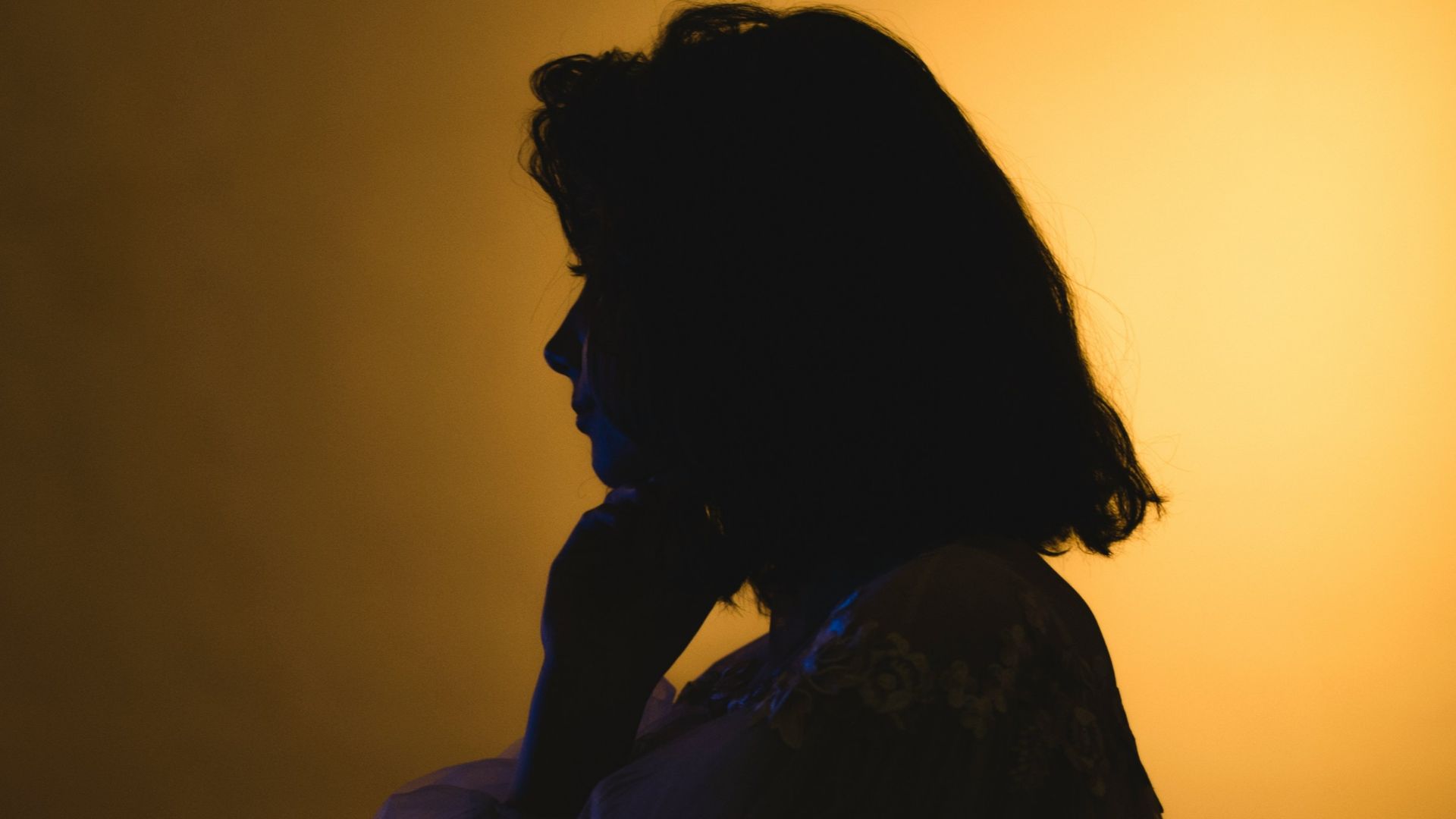 silhouette of woman in dress