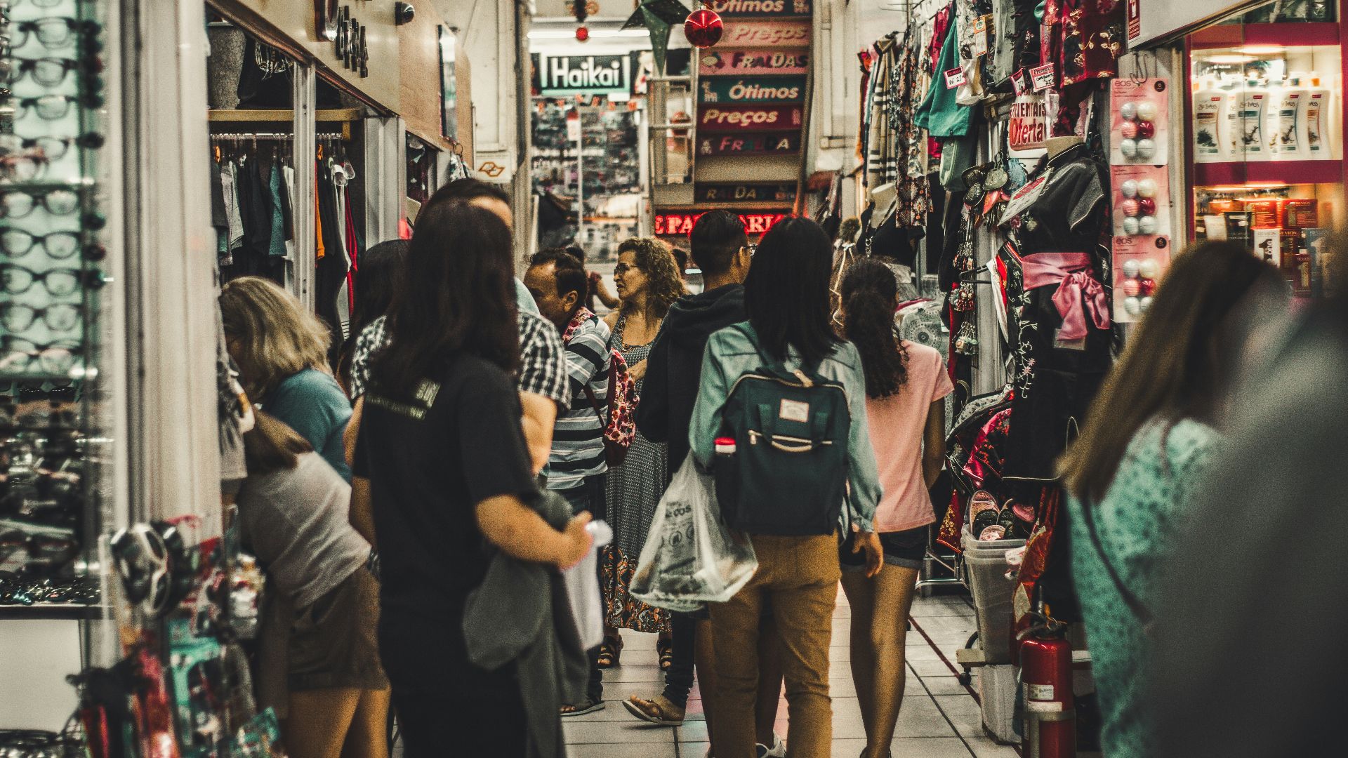 people walking flea market