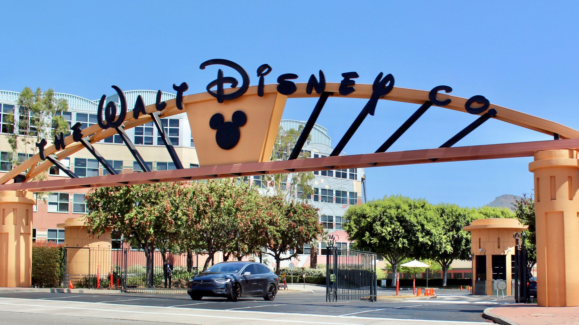 The Alameda Avenue entrance to the Walt Disney Studios in Burbank, California. This was taken just after a major renovation in summer 2016, in which the dated tropical pastels of the gateway arch were replaced with a more conservative orange-and-black col