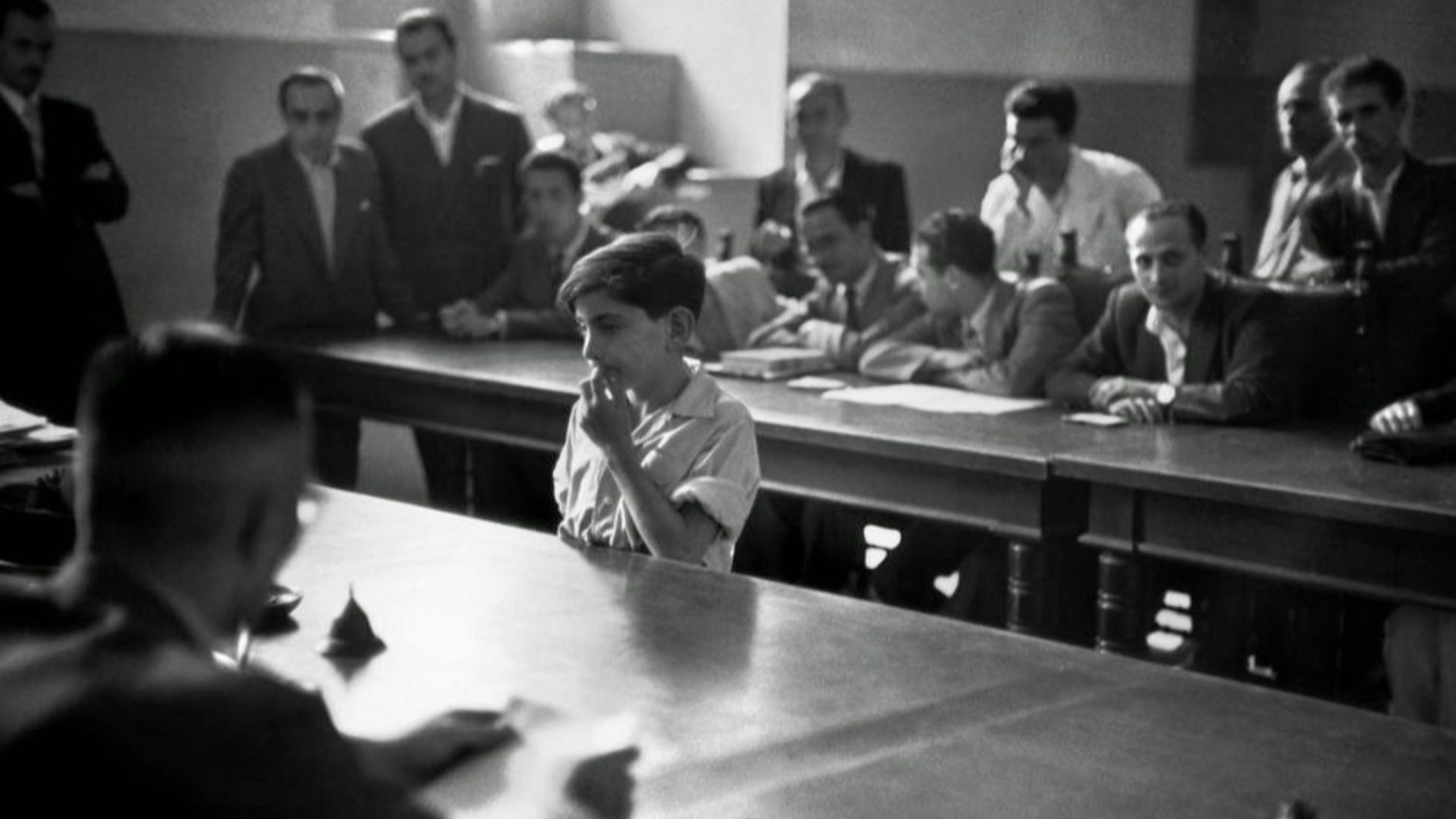 Naples 1948. Boy in front of the tribunal of the Juvenile Court, Albergo dei Poveri reformatory. Prostitutes, vagrants, and thieves were also sent there by the Naples Juvenile Court and taught embroidery by Catholic nuns. Over-population and misery have a