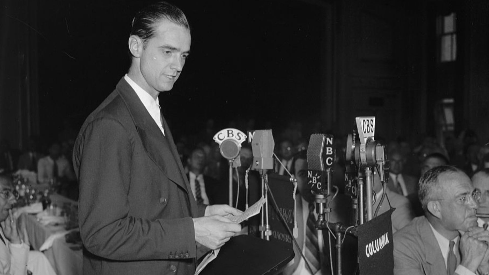 Title: Howard Hughes speaking before the Press Club. Washington, D.C., July 21. Howard Hughes, speaking at the National Press Club today, before hundreds of government officials and representatives of foreign governments. Hughes today envisioned a future 
