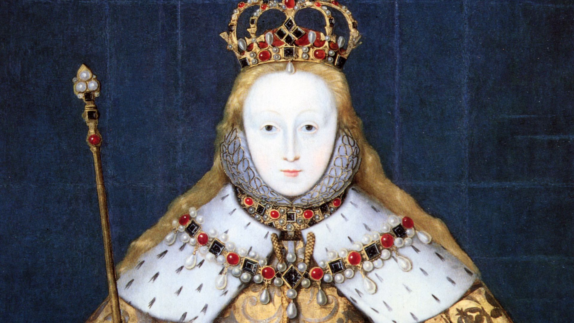 Queen Elizabeth I of England in her coronation robes, patterned with Tudor roses and trimmed with ermine. She wears her hair loose, as traditional for the coronation of a queen, perhaps also as a symbol of virginity. The painting, by an unknown artist, da