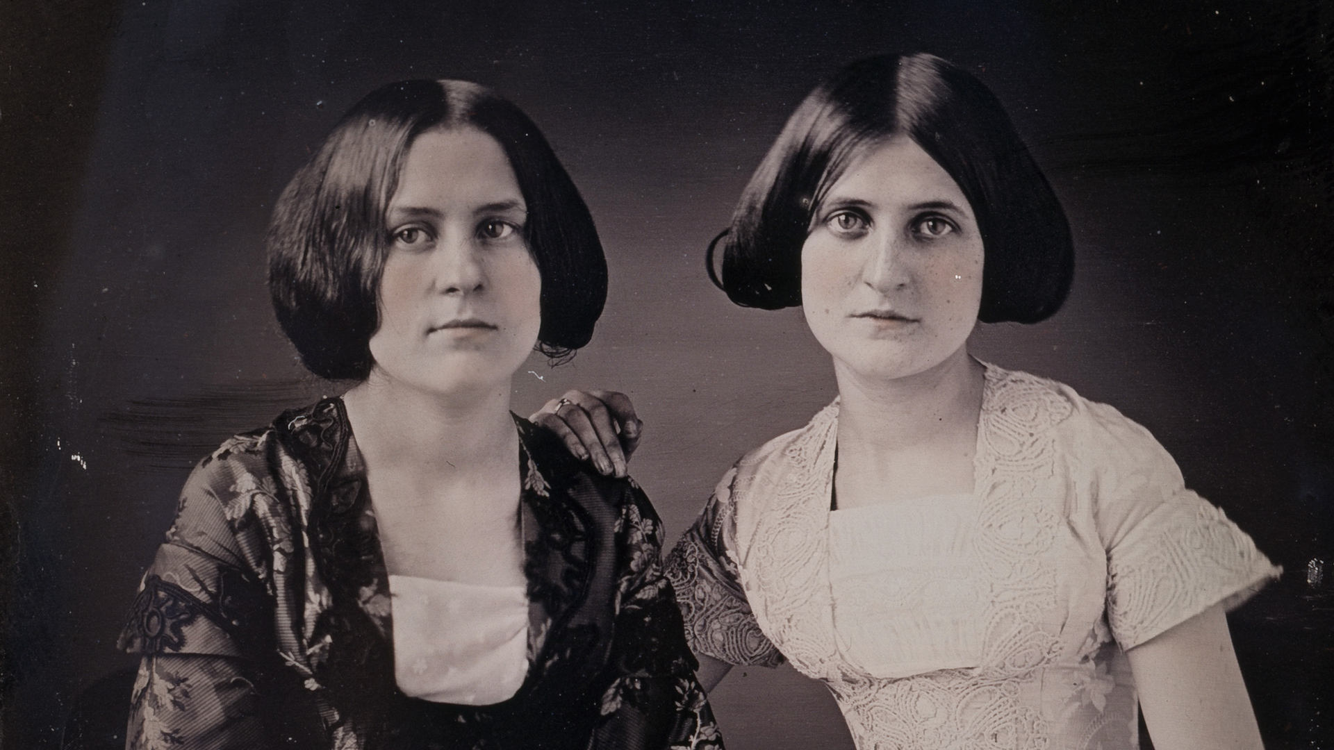 Portrait of Kate and Maggie Fox, Spirit Mediums from Rochester, New York. Along the bottom edge of the daguerreotype