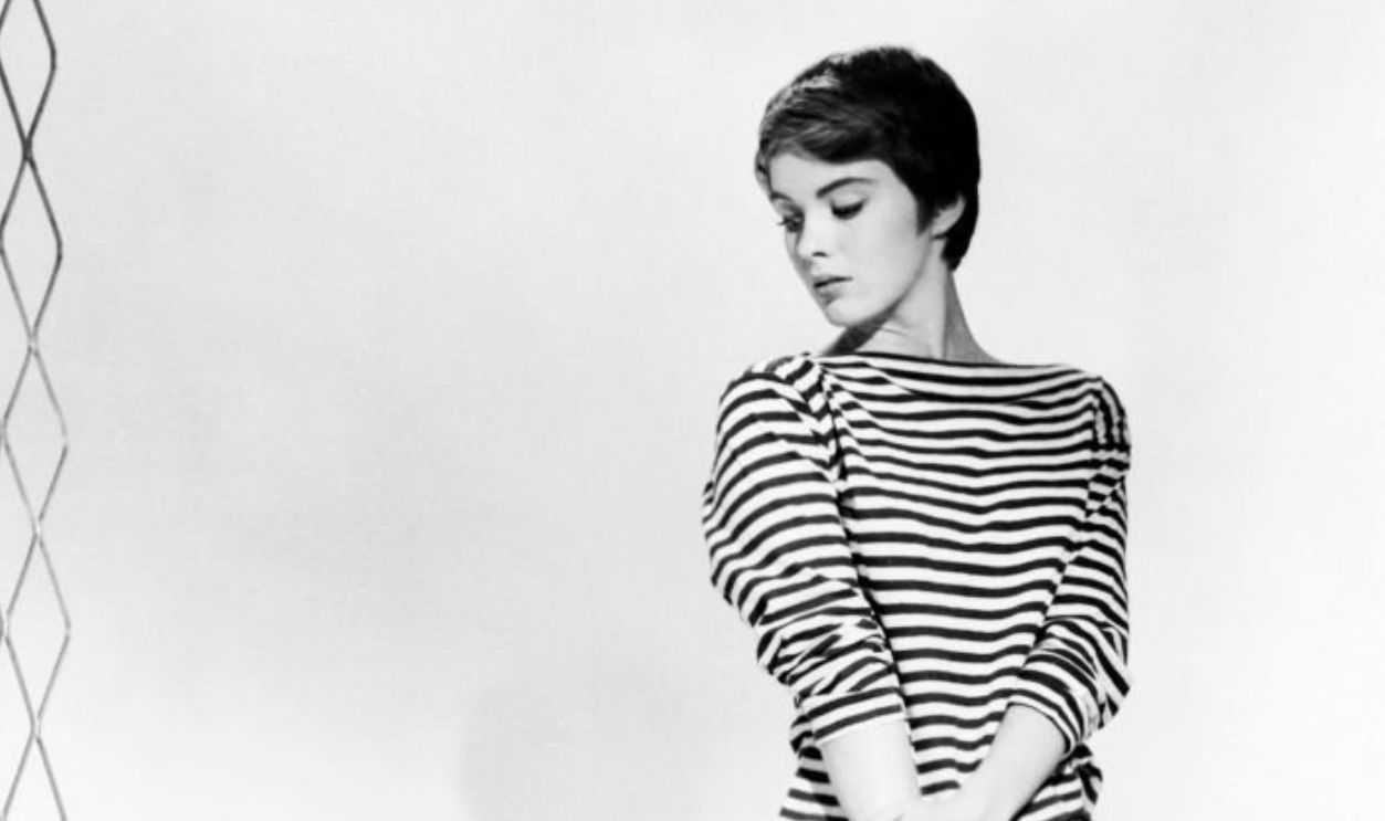 American actress Jean Seberg (1938 - 1979) as Helen Kokintz in a promotional portrait for 'The Mouse That Roared', directed by Jack Arnold, 1959. Beside her is the 'Q-bomb' doomsday device, which features in the film. 