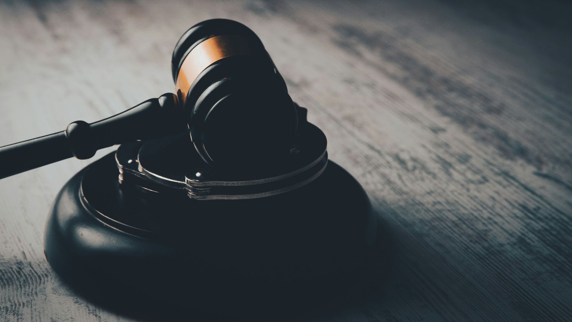 a judge's gaven on a wooden table