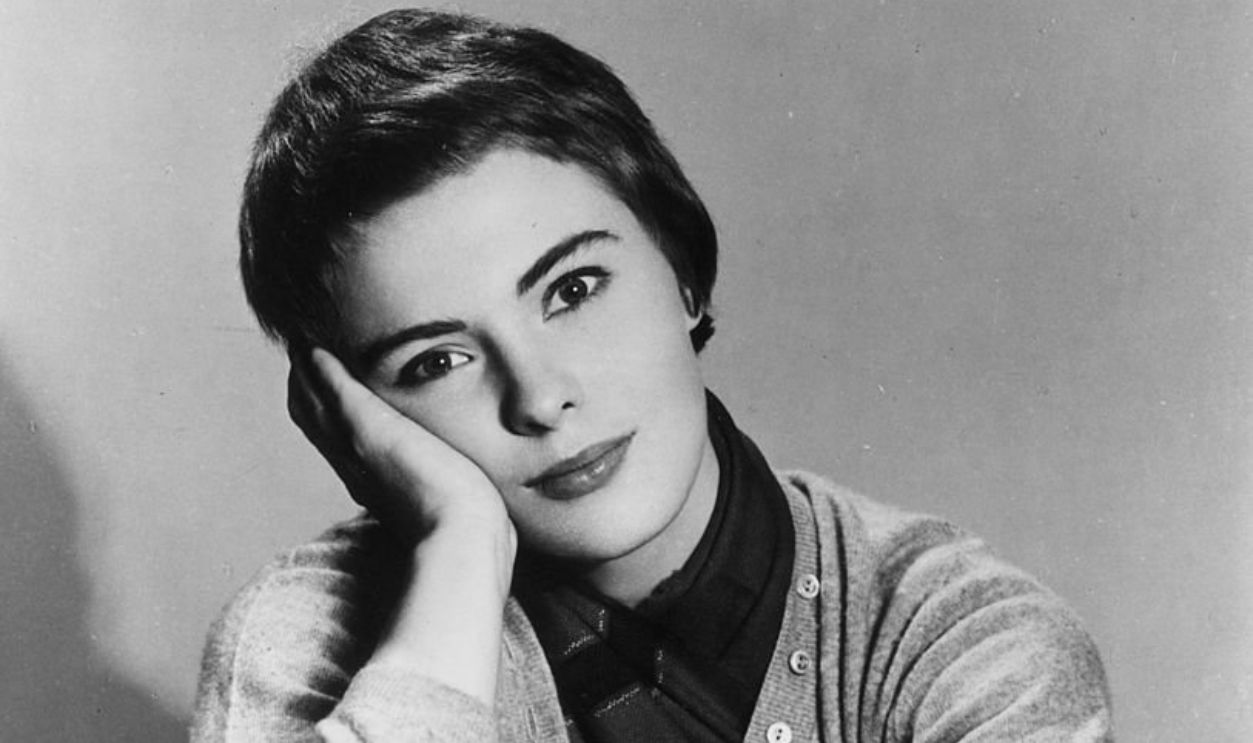 American actress Jean Seberg (1938 - 1979) sports a gamine haircut and a cardigan, 1956.
