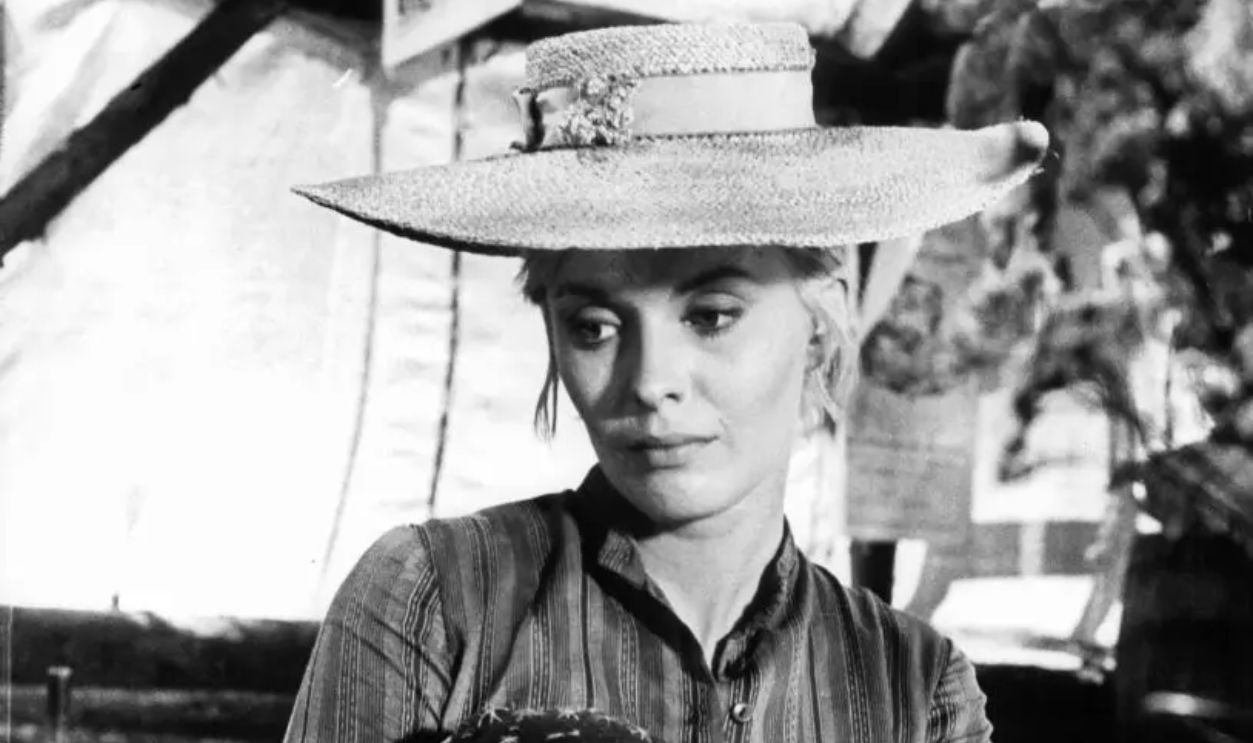 Jean Seberg sitting at table in a scene from the film 'Paint Your Wagon', 1969.