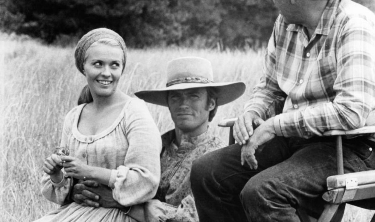 Jean Seberg, Clint Eastwood, and director Joshua Logan sitting in between scenes from the film 'Paint Your Wagon', 1969.