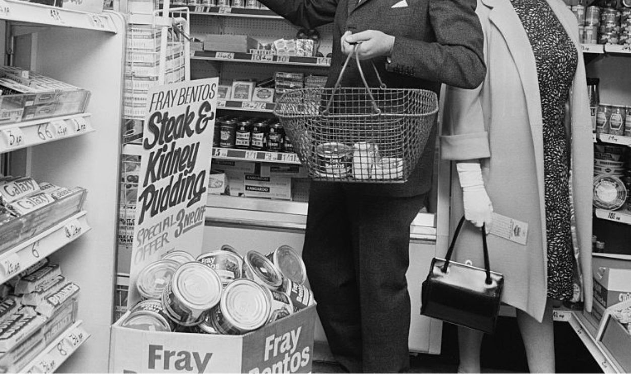 James Callaghan (Baron Callaghan of Cardiff) (1912 - 2005) and his wife Audrey (Audrey Callaghan, Baroness Callaghan of Cardiff) (1915 - 2005) shopping in an experimental decimal coinage supermarket, 12th May 1967. (