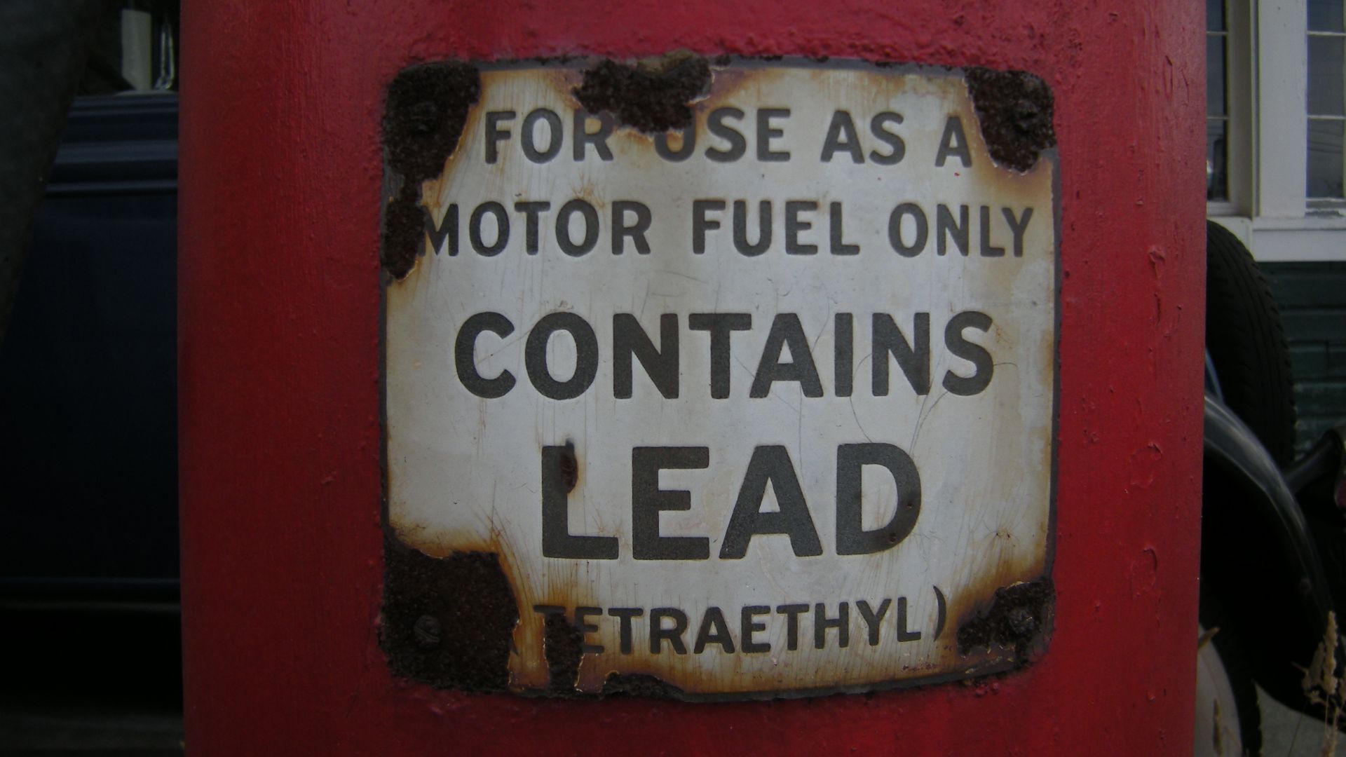 Lead warning on a gas pump at Keeler's Korner, Lynnwood, Washington. Keeler's Korner, a former grocery store and gas station (built 1927) listed on the National Register of Historic Places, listed 1982, NRHP listing #82004287.