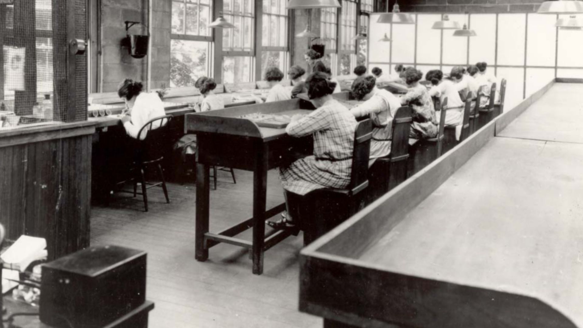 Radium Girls work in a factory of the United States Radium Corporation.