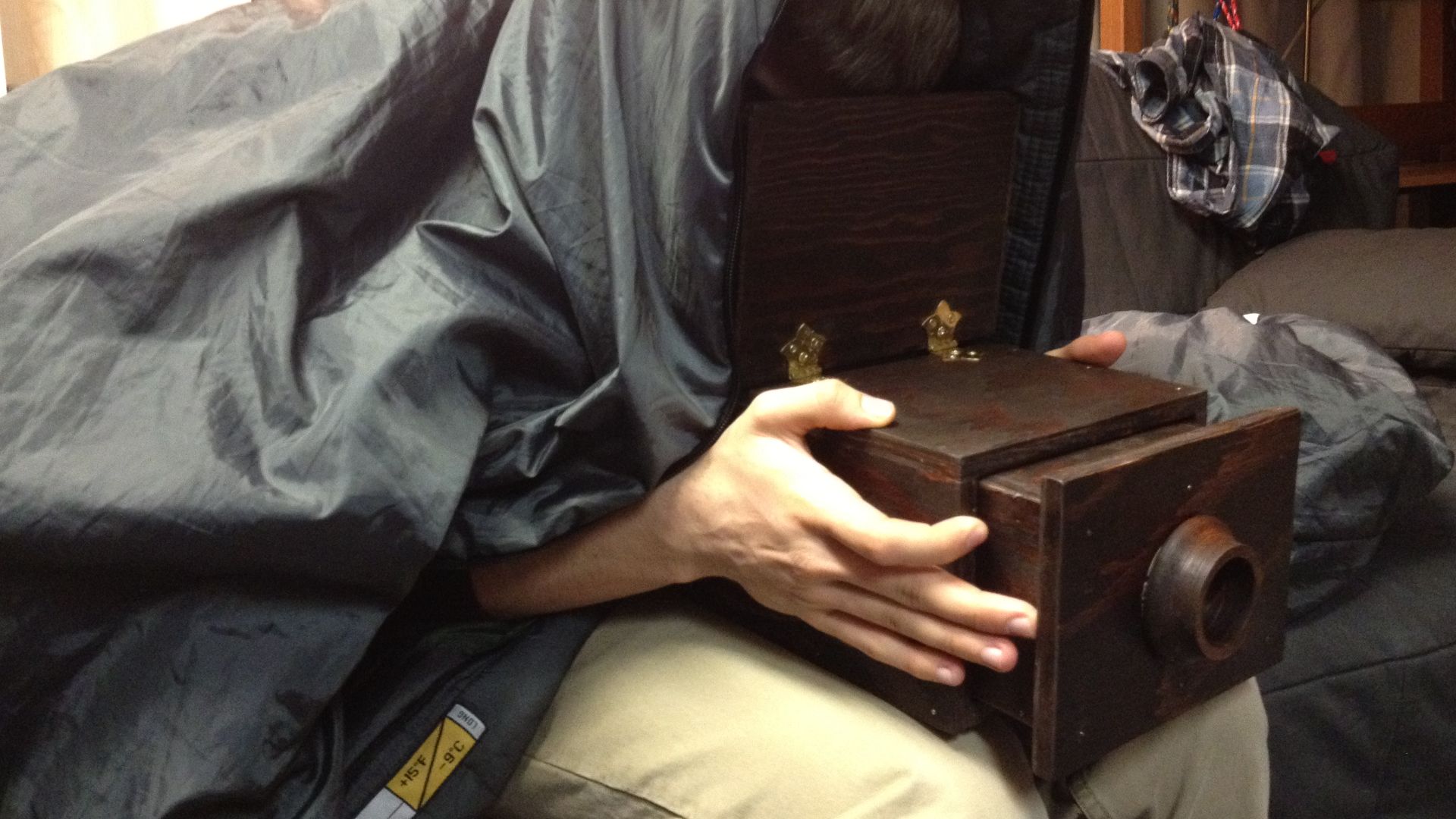 Usage of a modern day camera obscura used indoors.