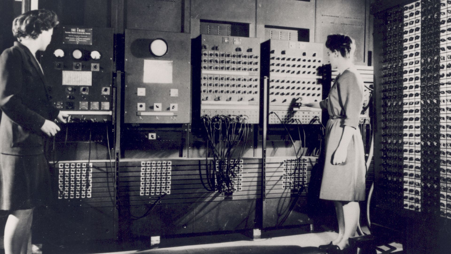 Two of the ENIAC programmers, are preparing the computer for Demonstration Day in February 1946.