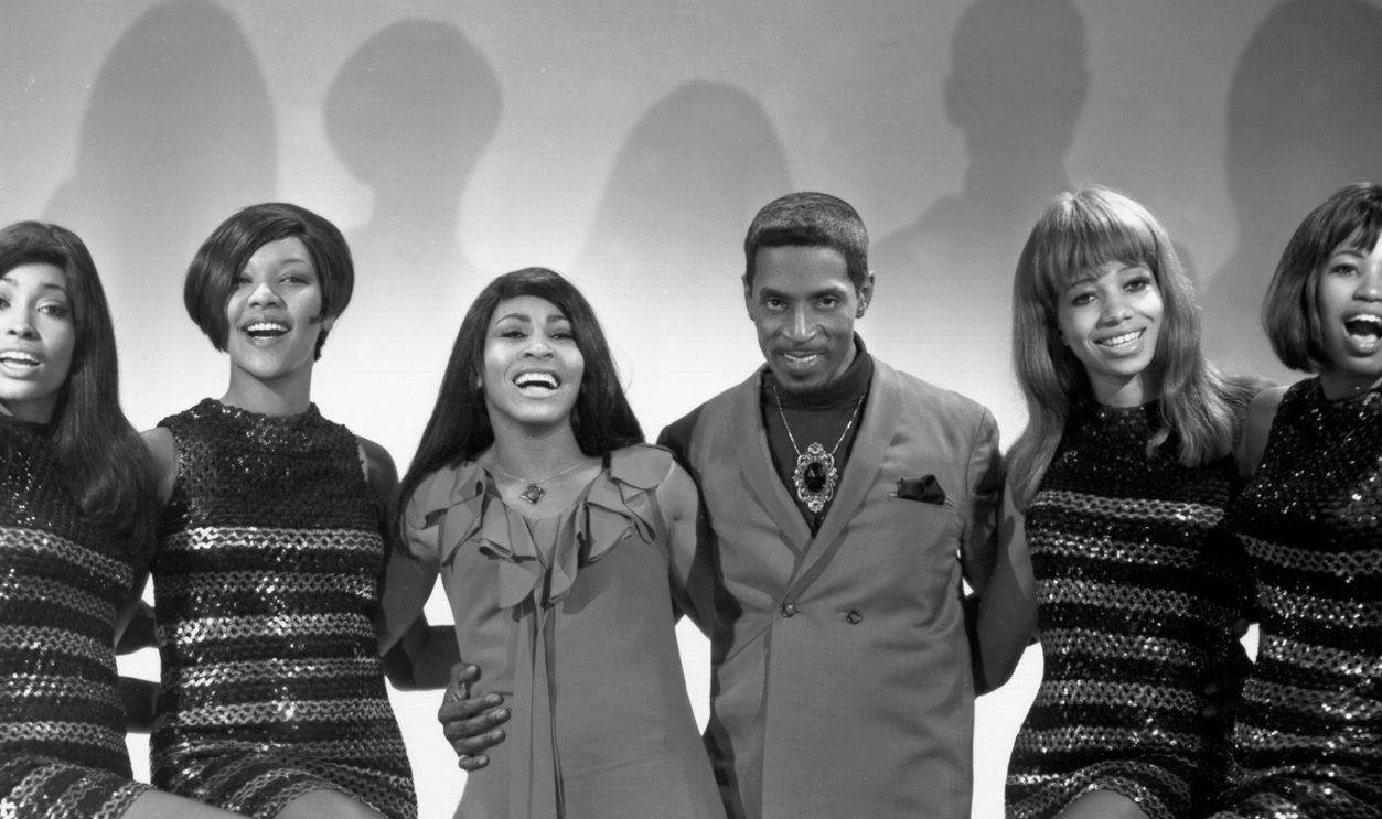 Husband-and-wife R&B duo Ike & Tina Turner pose for a portrait with their back up dancers 