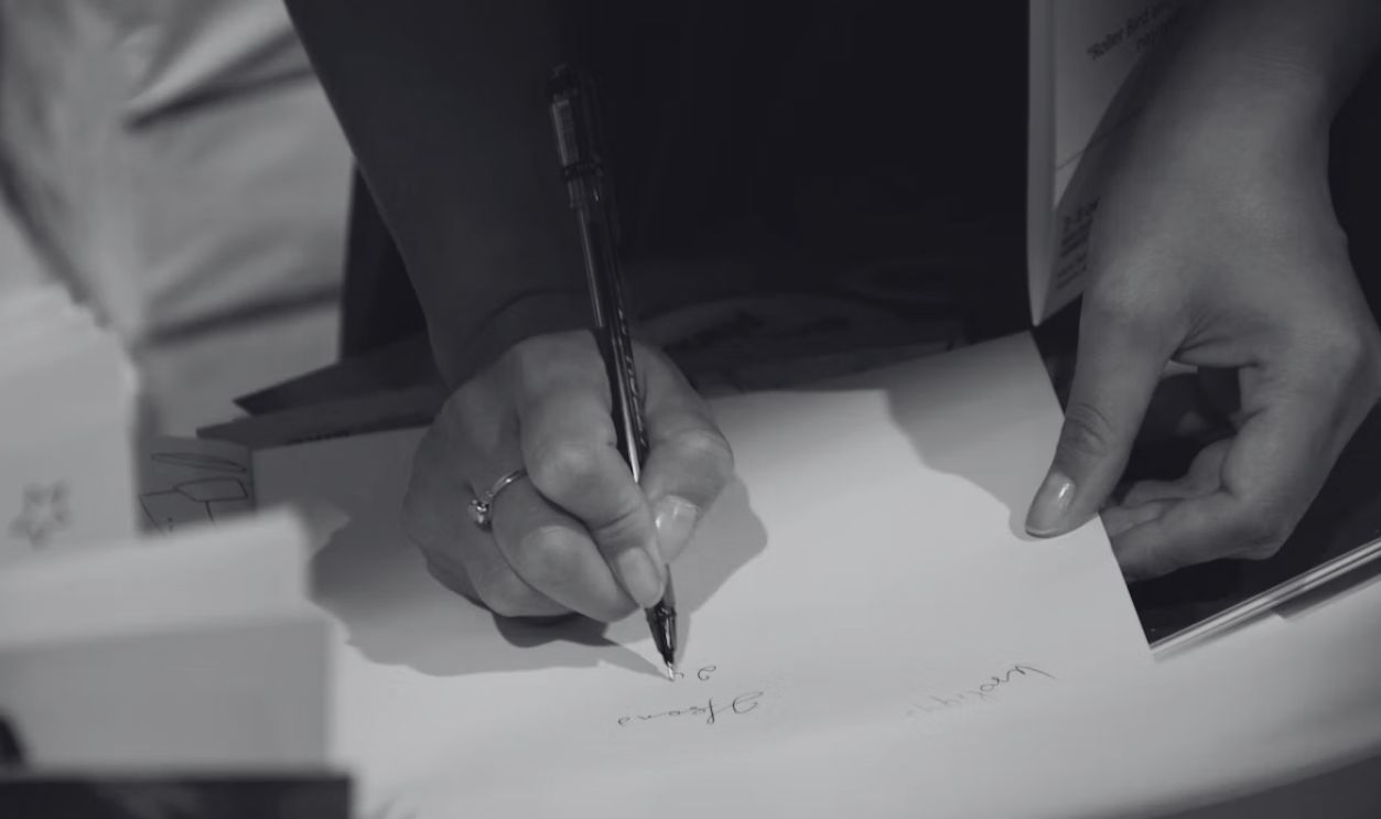person signing document 
