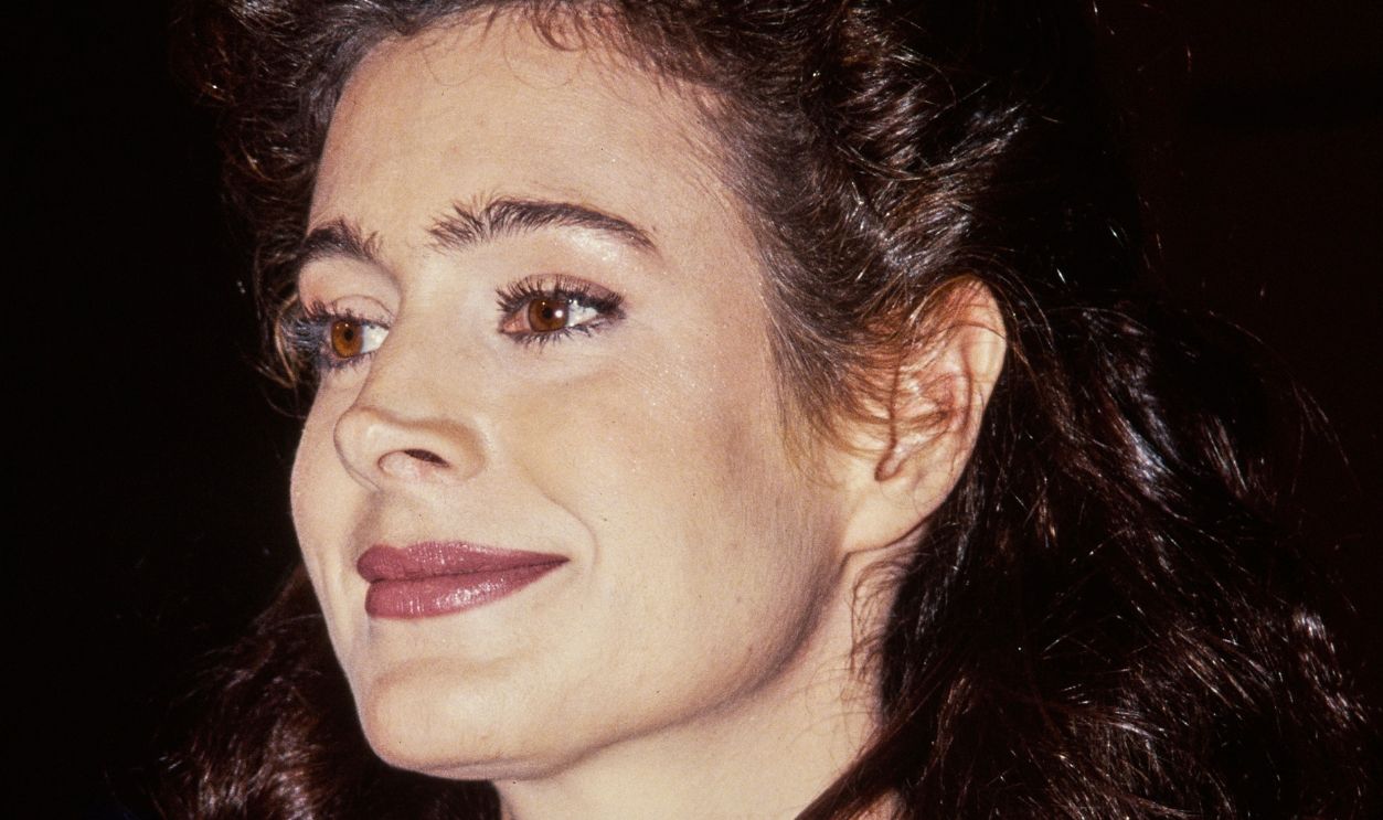 American actress Sean Young, wearing a peach-coloured outfit with filigree panels on the jacket, attends the Westwood premiere of 'Fatal Instinct' at the Mann Bruin Theatre in the Westwood neighbourhood of Los Angeles, California, 27th October 1993.