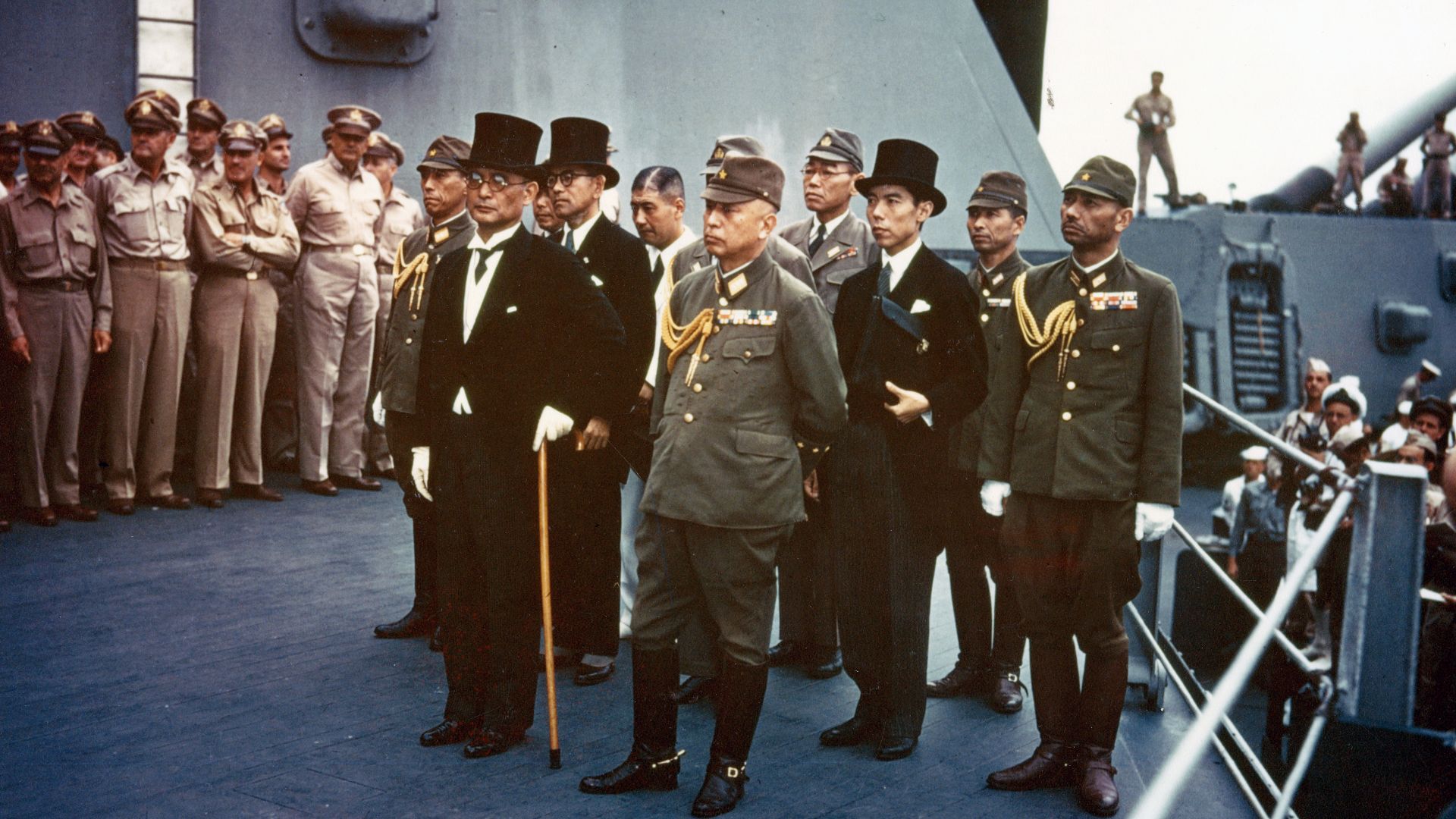 Surrender of Japan, Tokyo Bay, 2 September 1945: Representatives of the Empire of Japan on board USS Missouri (BB-63) during the surrender ceremonies.
Standing in front are:
Foreign Minister Mamoru Shigemitsu (wearing top hat) and General Yoshijirō Umezu,