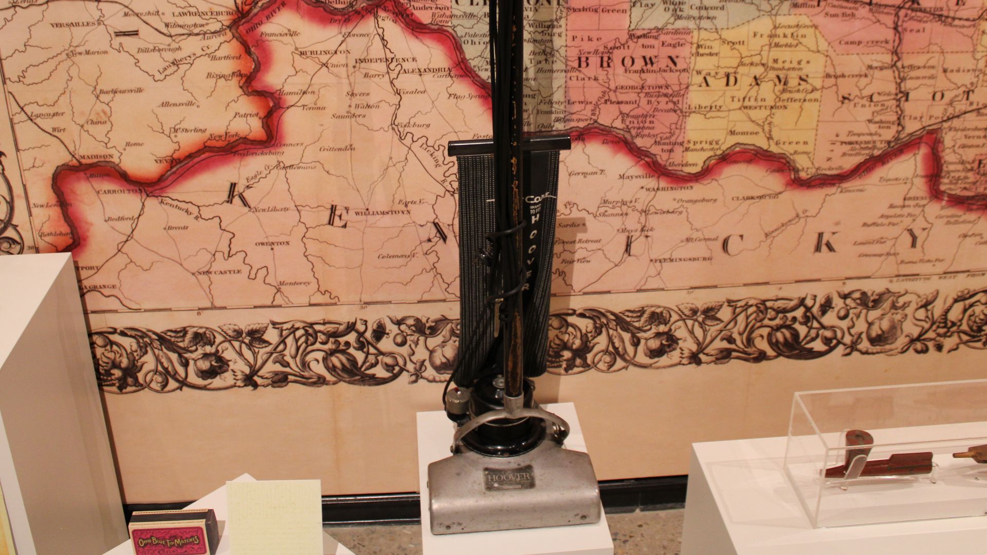 Vacuum cleaner on display with assorted items
