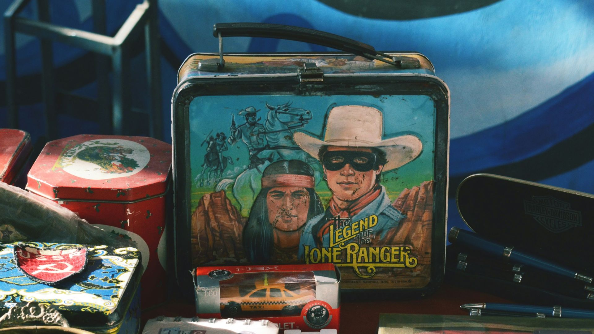 a suitcase with a picture of two men on it
