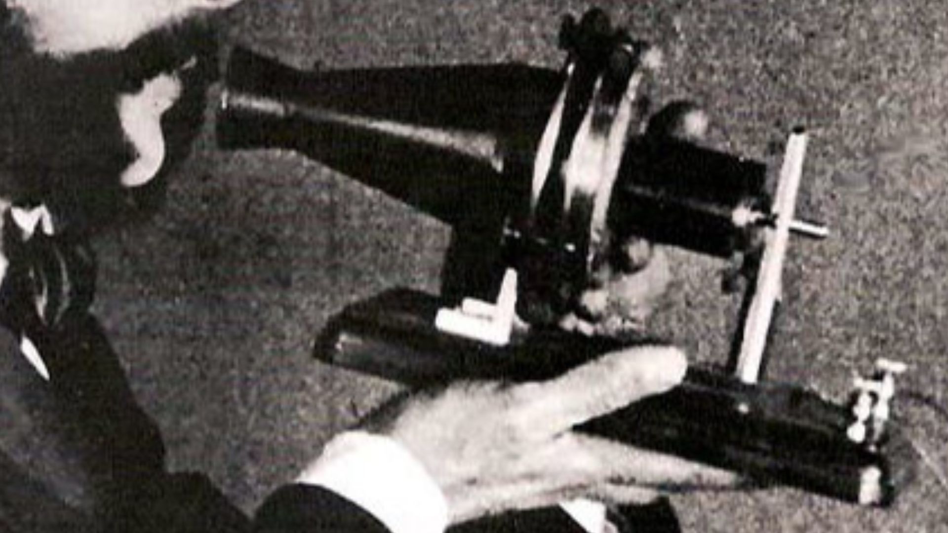 An actor portraying Alexander Graham Bell speaking into a early model of the telephone for a 1926 promotional film by the American Telephone & Telegraph Company (AT&T): see 1926 recreation of Alexander Graham Bell inventing the telephone. AT&T Archives. A