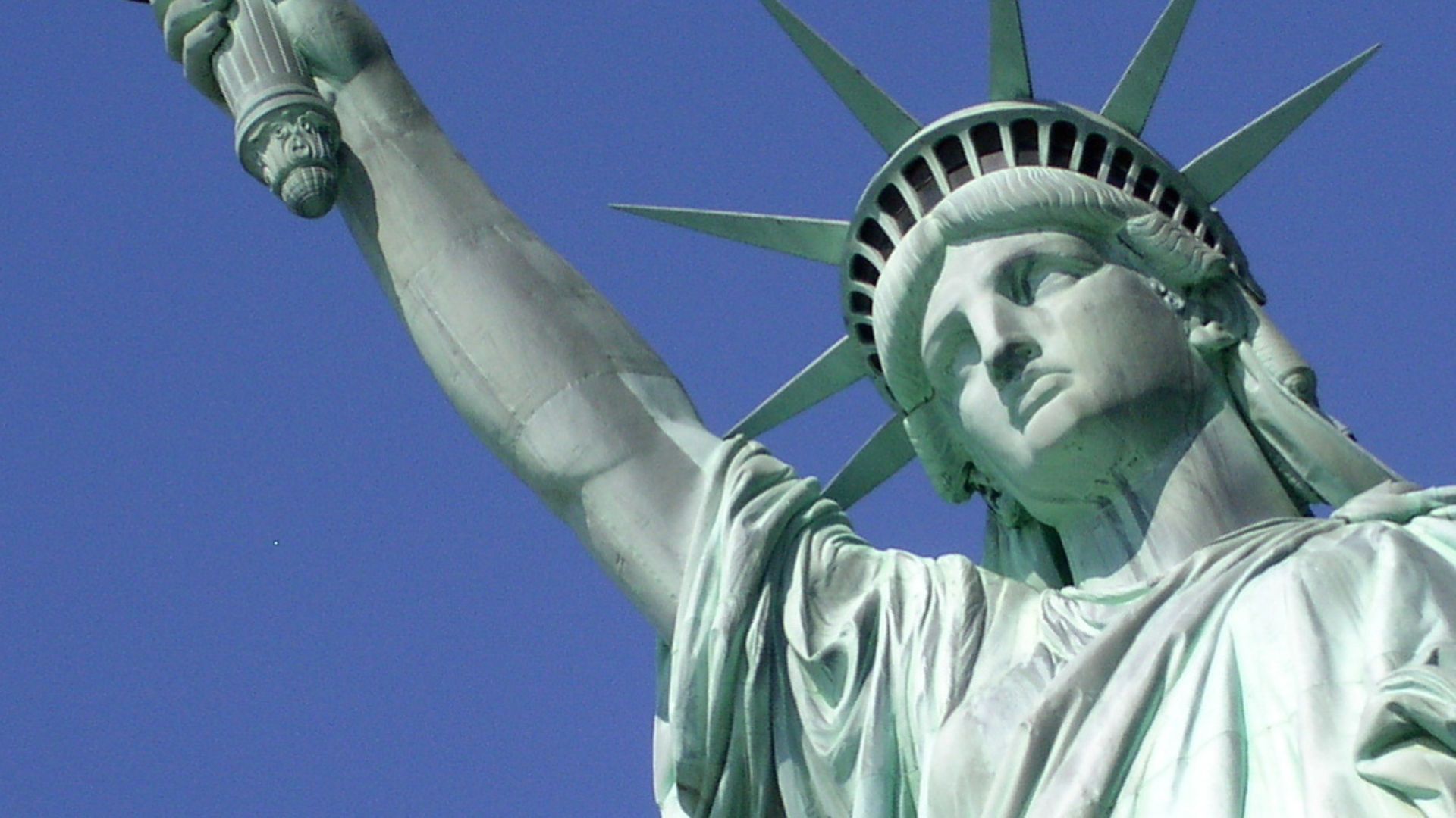 Wikivoyage banner: Statue of Liberty, NY, in sunlight
