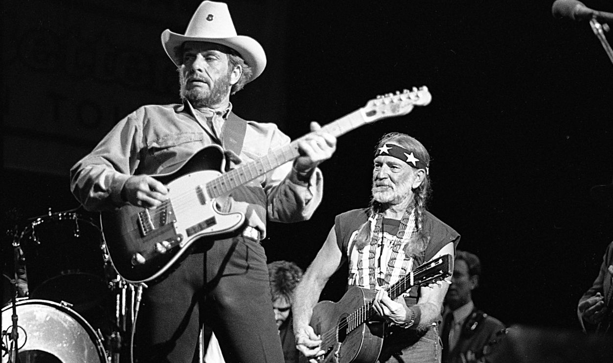 Country musician Merle Haggard performs with a Fender Telecaster with Willie Nelson in August 26, 1988.