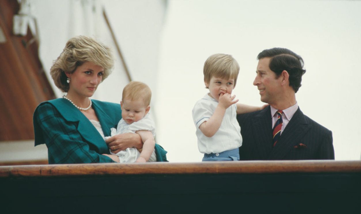 Prince Charles and Diana, Princess of Wales (1961 - 1997) on the royal yacht 'Britannia' with their sons William and Harry during a visit to Venice, Italy, April 1985.