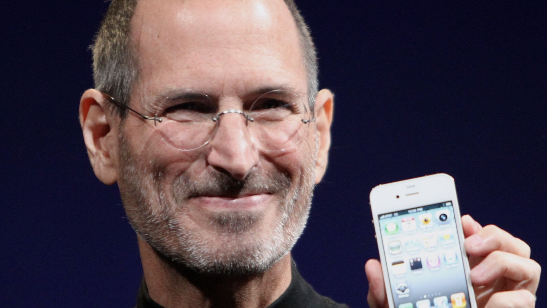 Steve Jobs shows off the iPhone 4 at the 2010 Worldwide Developers Conference.