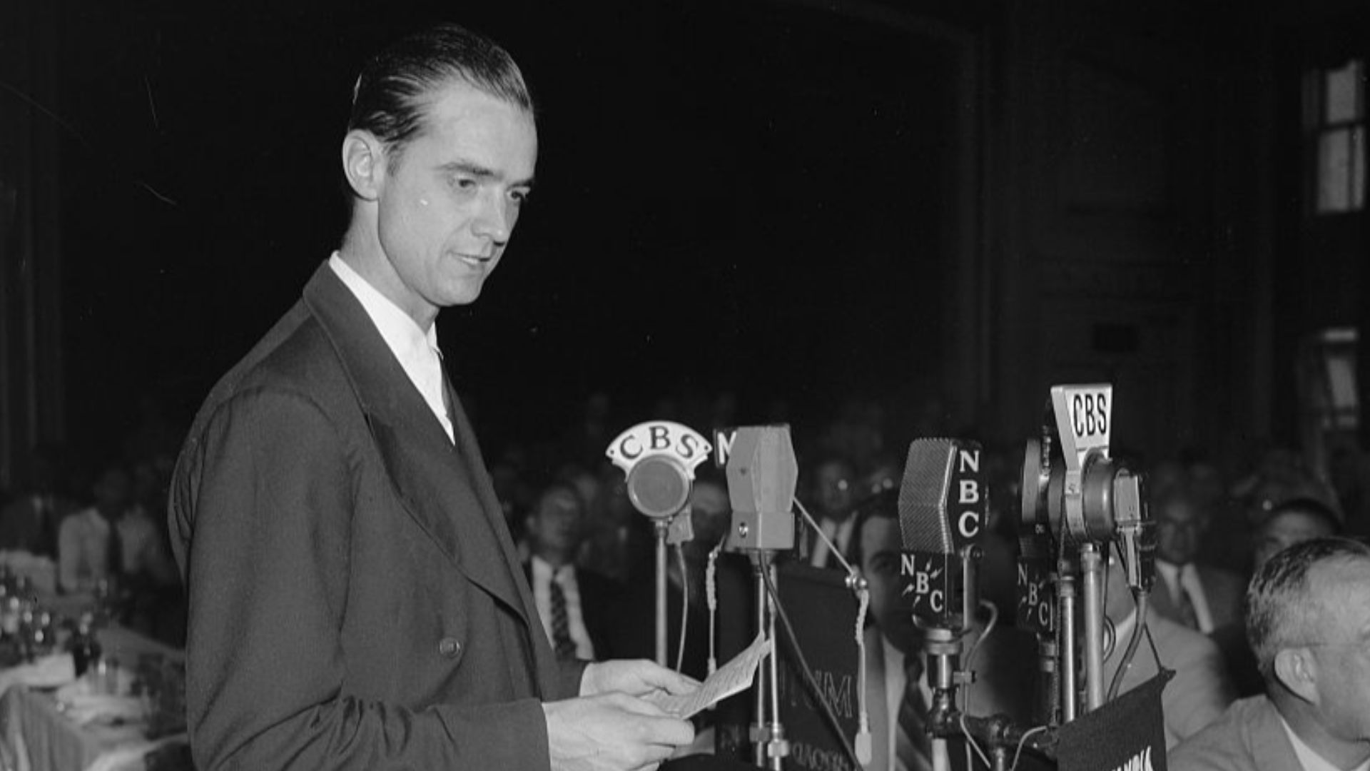 Title: Howard Hughes speaking before the Press Club. Washington, D.C., July 21. Howard Hughes, speaking at the National Press Club today, before hundreds of government officials and representatives of foreign governments. Hughes today envisioned a future 