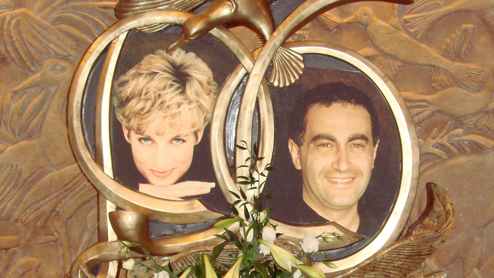 One of the two memorials to Diana, Princess of Wales, and Dodi Al-Fayed, located in the Harrods department store in London.  The pyramid-shaped display holds a wine glass still smudged with lipstick from Diana's last dinner as well as an engagement ring D