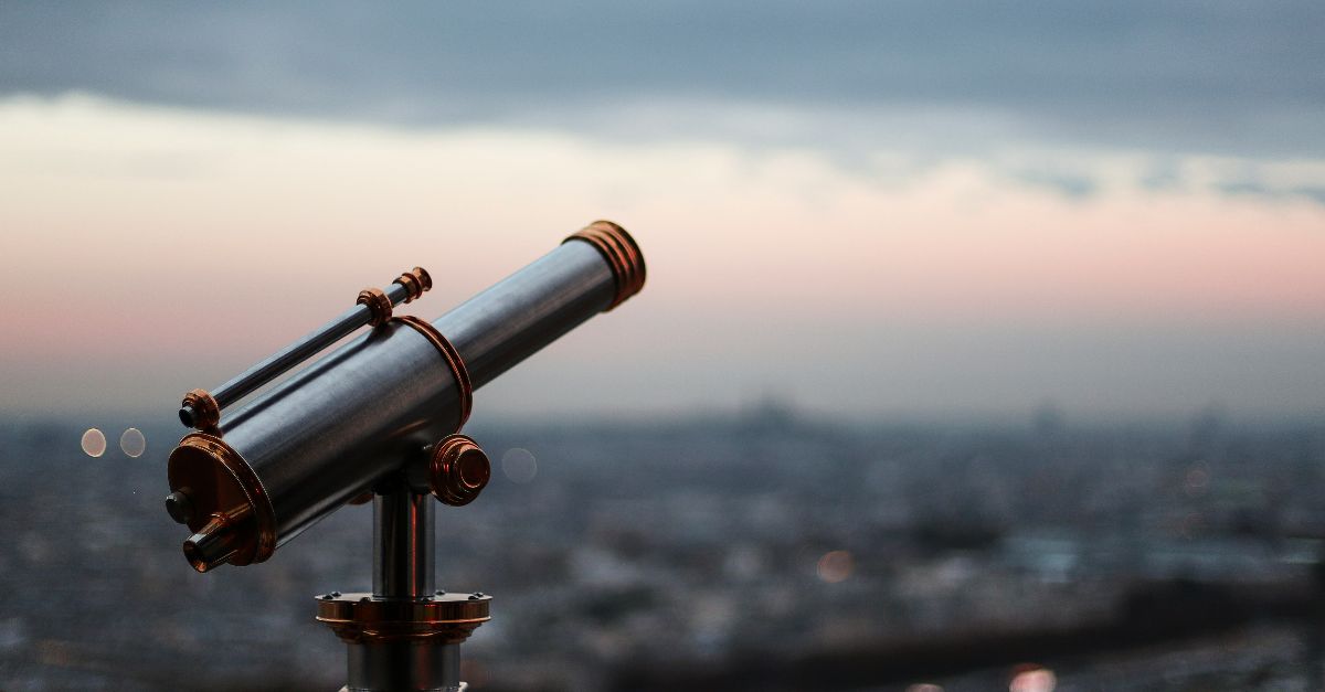black telescope during day time