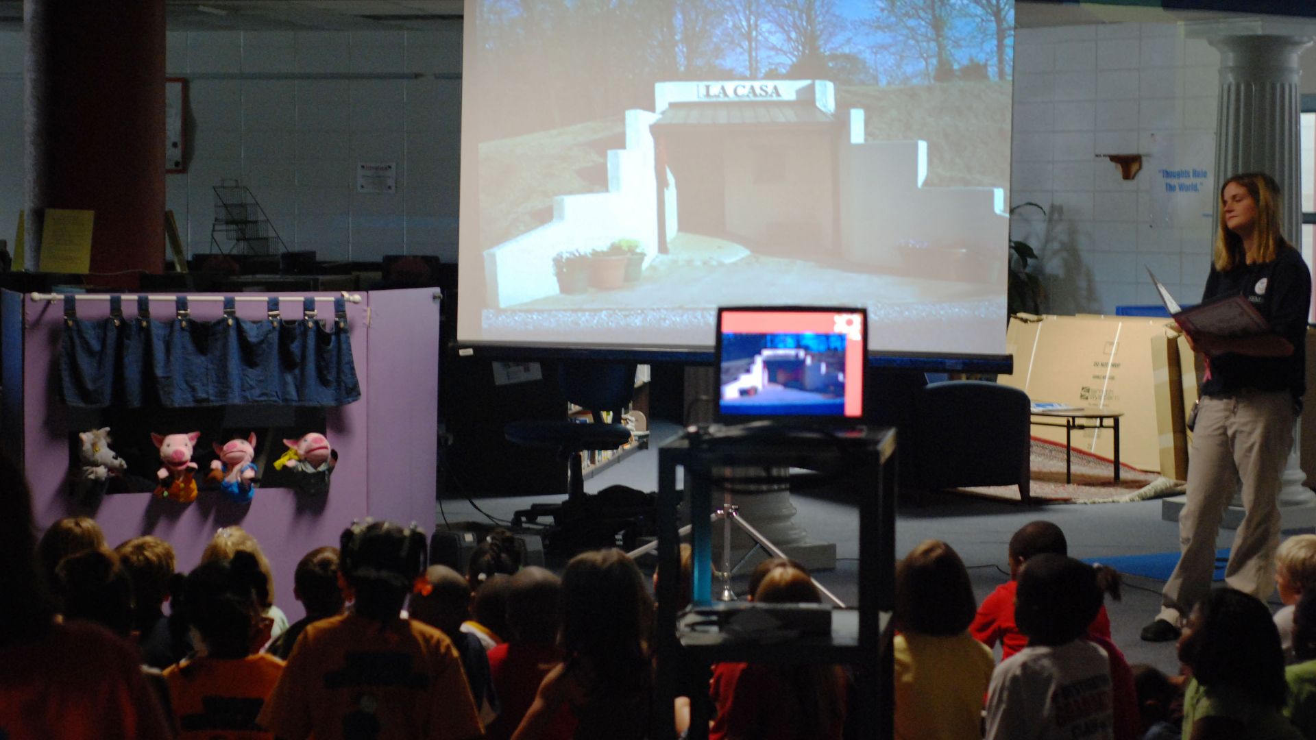 Pascagoula, Miss., June 26, 2008--Students enrolled in Pascagoula School District's Summer Explorations program watch a puppet show presented by FEMA in the Classroom (FITC) members Neily Chapman, Kiiva Williams and Jennifer Smits. FITC is a new program c