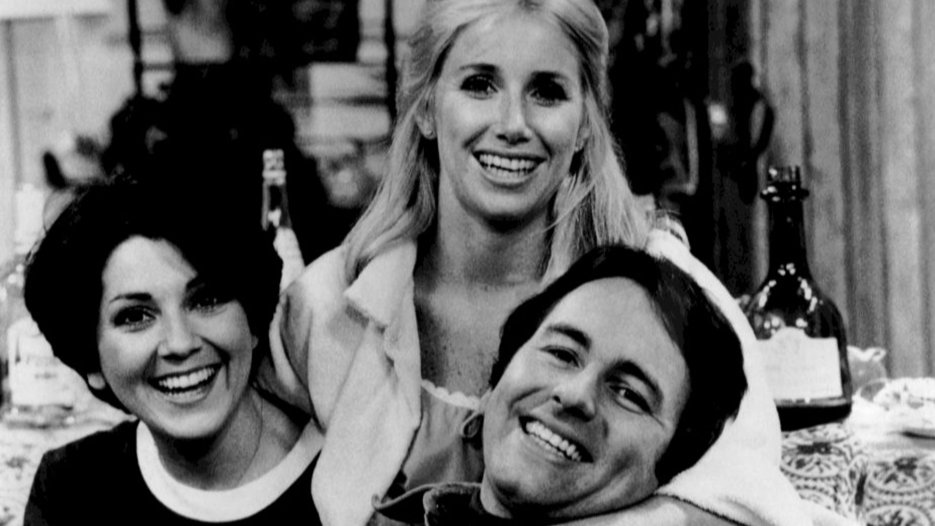 Publicity photo of the roommates from the television program Three's Company.  From left: Joyce DeWitt (Janet}, Suzanne Sommers (Chrissy), John Ritter (Jack).
