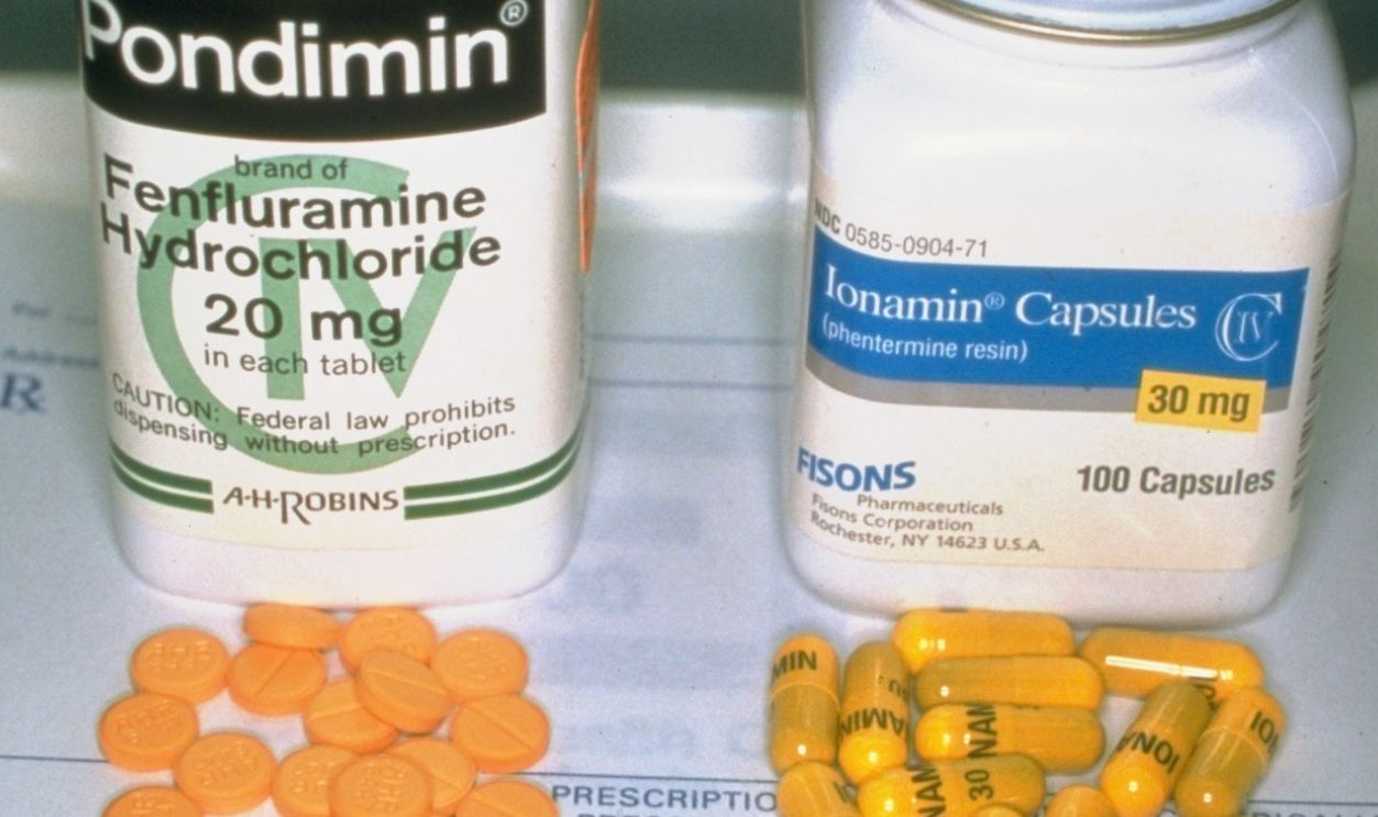 Pills & bottles of fenfluramine & phentermine, A.K.A fen/phen, diet pills.