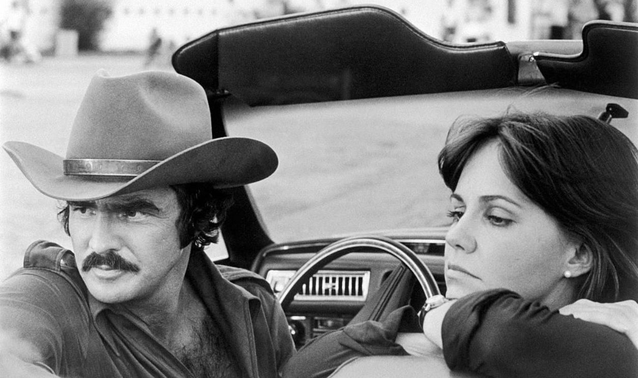(Original Caption) Burt Reynolds and Sally Field in a scene from the movie, Smokey and the Bandit.