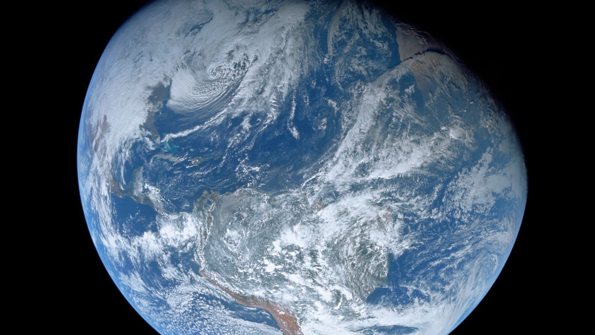 One of the first images taken by humans of the whole Earth. Photographed by the crew of Apollo 8 (probably by Bill Anders) the photo shows the Earth at a distance of about 30,000 km. North is at the top, with South America visible at the covering the bott