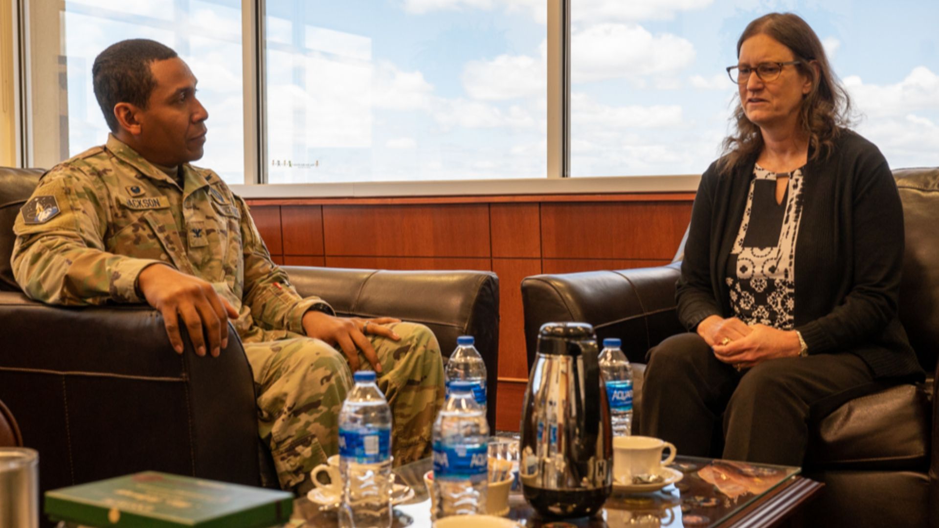 Col. Marcus Jackson, Space Base Delta 2 commander, alongside Dr. Michele Gaudreault, Deputy Chief Scientist, Space Operations Command, begin their office call at Buckley Space Force Base, Colo., April 28, 2023. Dr. Gaudreault visited Space Base Delta 2, a