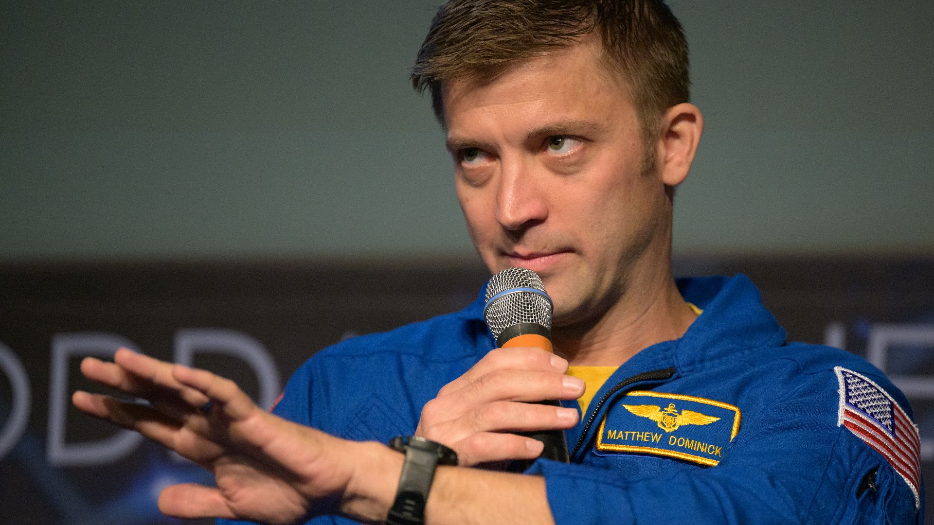 NASA astronaut Matthew Dominick, is seen during an Expedition 71 postflight presentation, Monday, March 3, 2025, at the Mary W. Jackson NASA Headquarters Building in Washington. Dominick, Michael Barrett, Tracy Dyson, and Jeanette Epps served as part of E
