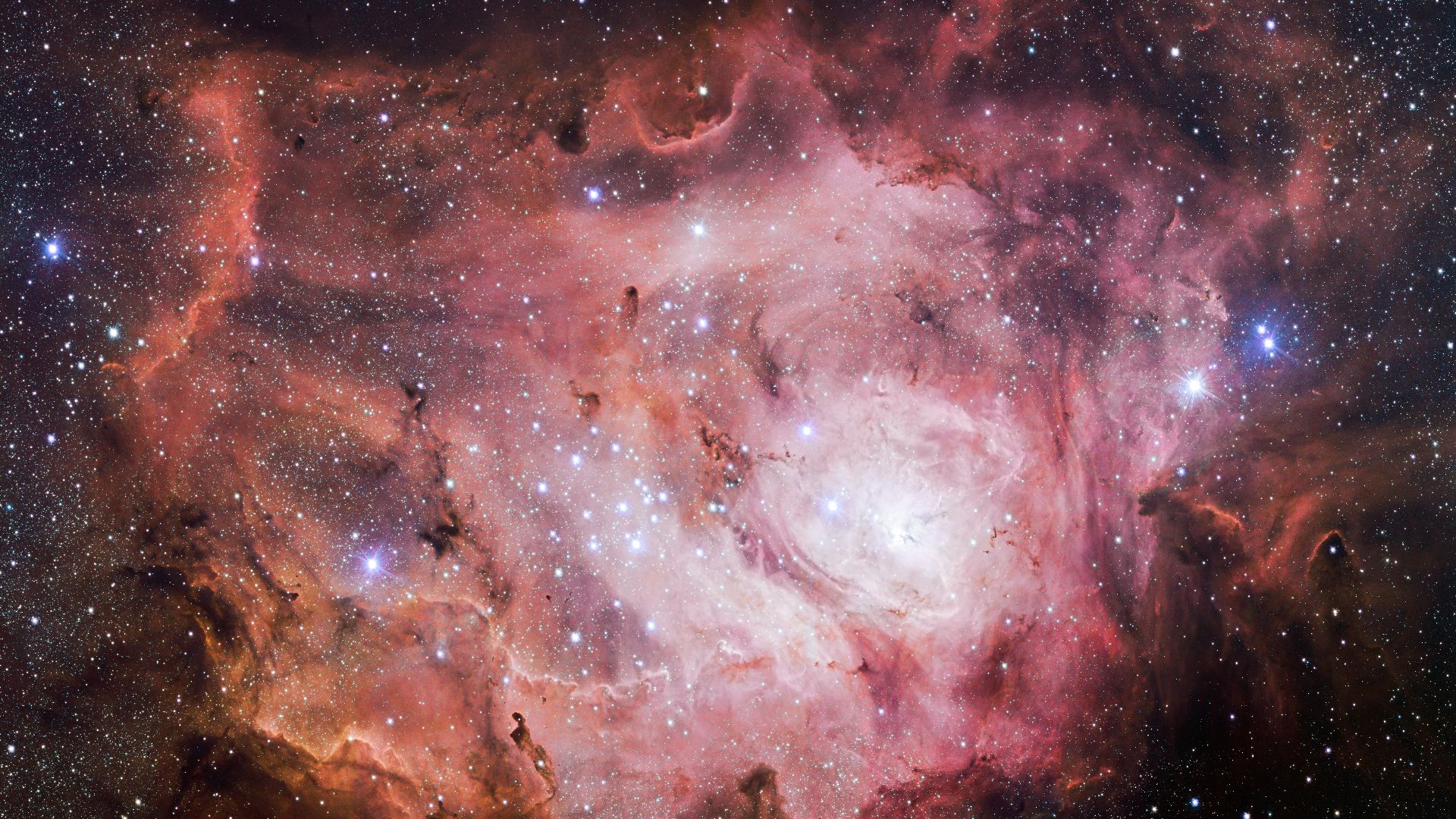 The VLT Survey Telescope (VST) at ESO's Paranal Observatory in Chile has captured this richly detailed new image of the Lagoon Nebula. This giant cloud of gas and dust is creating intensely bright young stars, and is home to young stellar clusters. This i