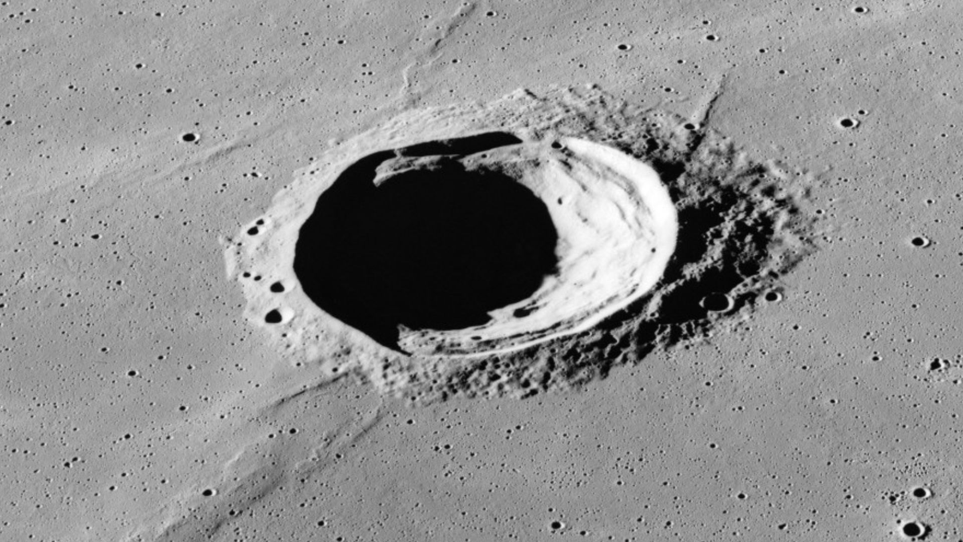 Oblique view of Schiaparelli, on the moon, facing south. It is clear in this view that the mare material has covered the ejecta of the crater.