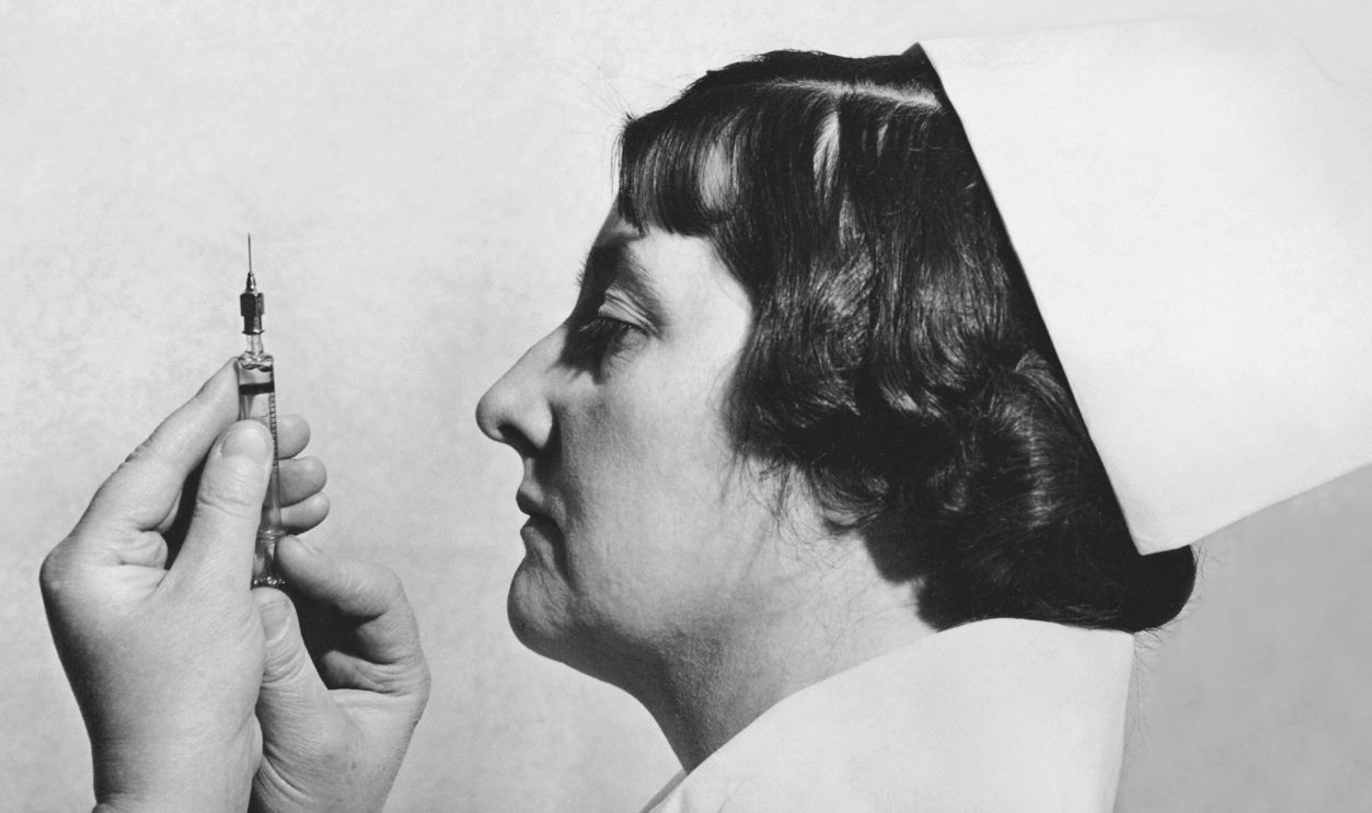 A nurse at the Horace Berk Memorial Hospital prepare an insulin injection for the treatment of insanity, Philadelphia, Pennsylvania, March 28, 1938. Dr Manfre Sakel of Vienna discovered three years ago that an 'insulin shot shock treatment' causes the body to burn its sugar, depriving the brain of its sole source of energy and often induces violent shock which frequently affects a complete cure of the mental ailment.