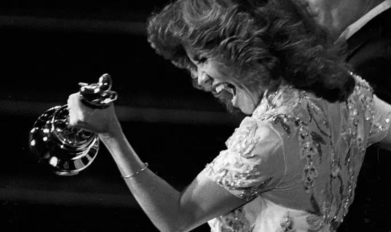 EDITORIAL USE ONLY: Sally Field, winner, Actress in a Leading Role (NORMA RAE), and presenter Richard Dreyfuss at the 1979 (52nd) Academy Awards ceremony.