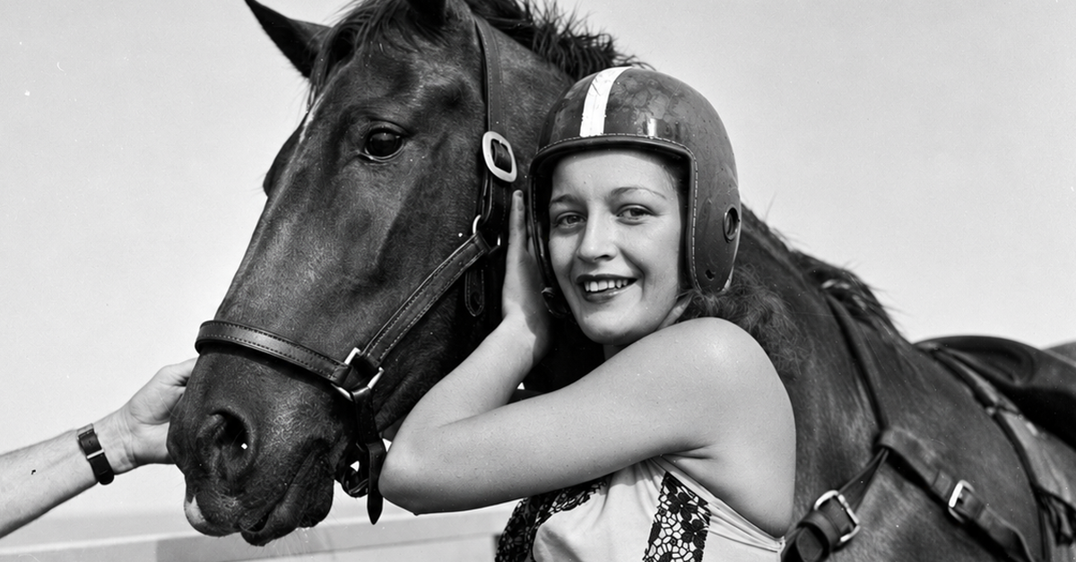 circa 1955: Dinah, a diving horse stands with her rider just after a dive.