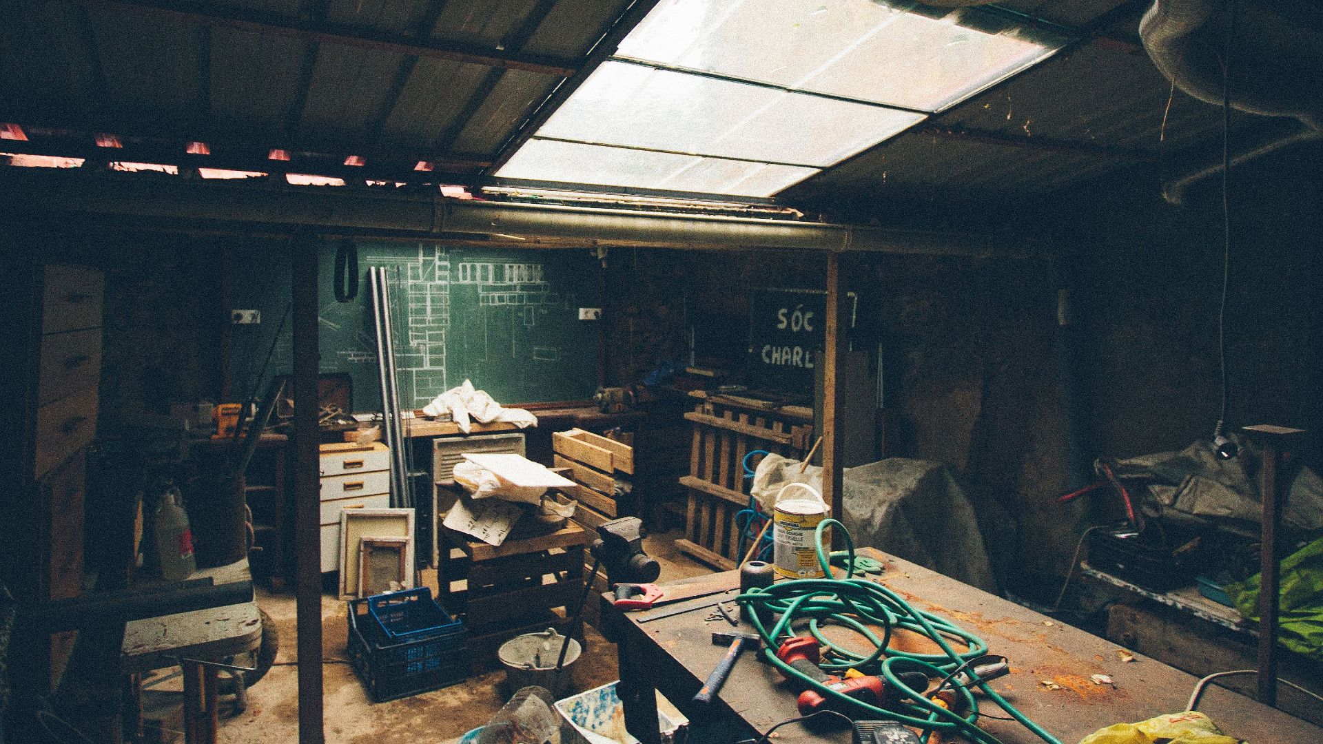 Charming workshop filled with tools and equipment, ideal for creative projects.