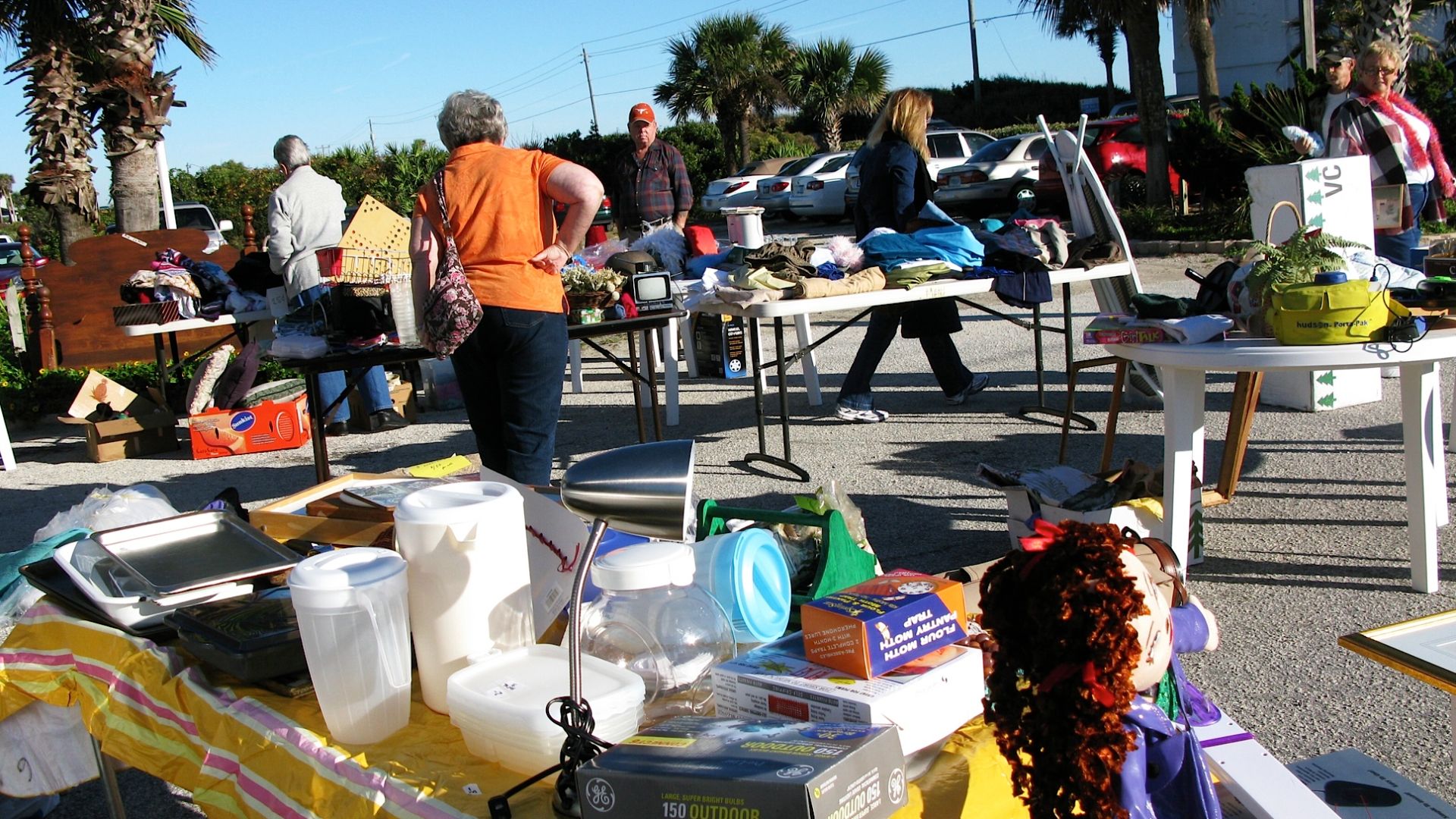 Scope and content:  The original finding aid described this photograph as:
Original Caption: Shoppers look through the variety of goods for sale at a designated stop along the A1A Super Scenic 72-mile Garage Sale.
Location: Florida

Status: Public domain.