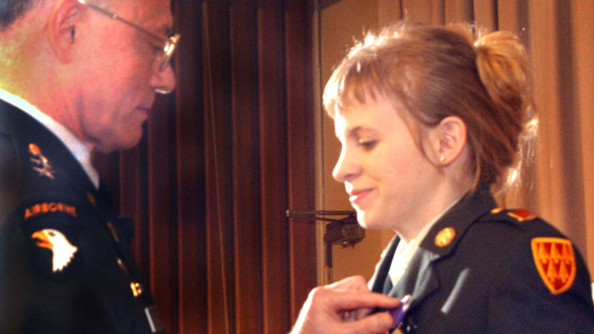 Jessica Lynch is awarded the Bronze Star, Prisoner of War, and Purple Heart medals on July 22, 2003.